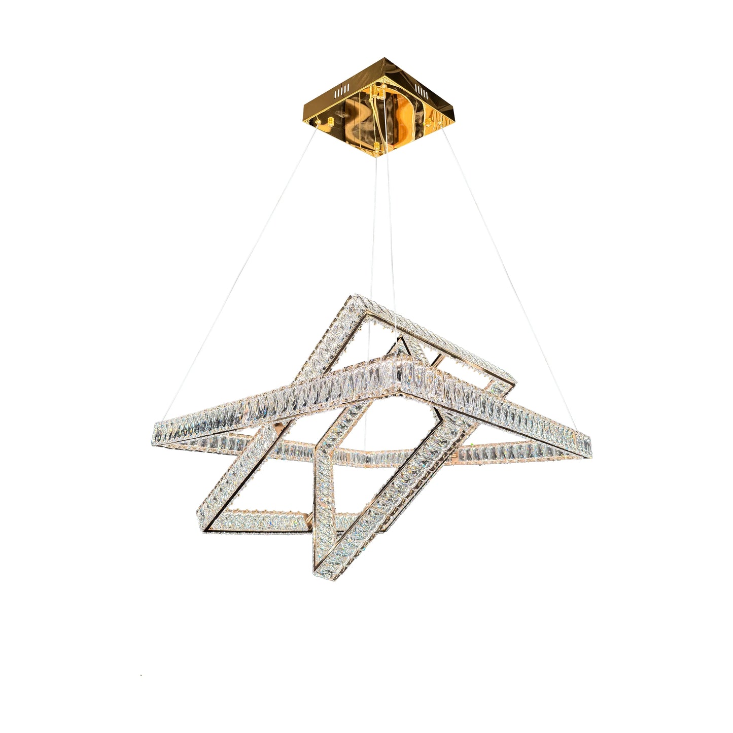 Studio shot of the modern 3-tier gold crystal chandelier isolated on a white background.