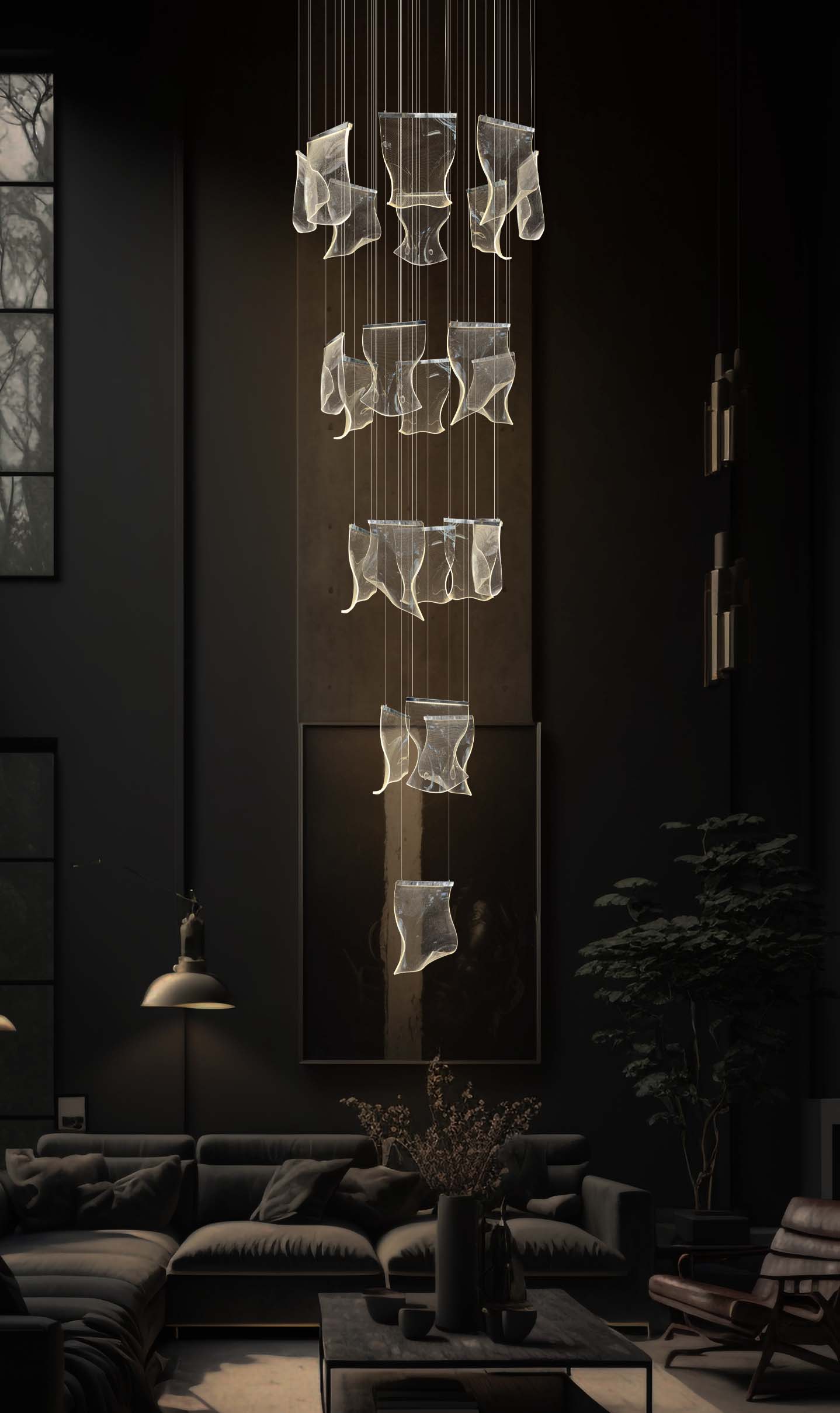 Adjustable LED wave chandelier with dimmable lighting suspended in a bright modern foyer with high ceilings.