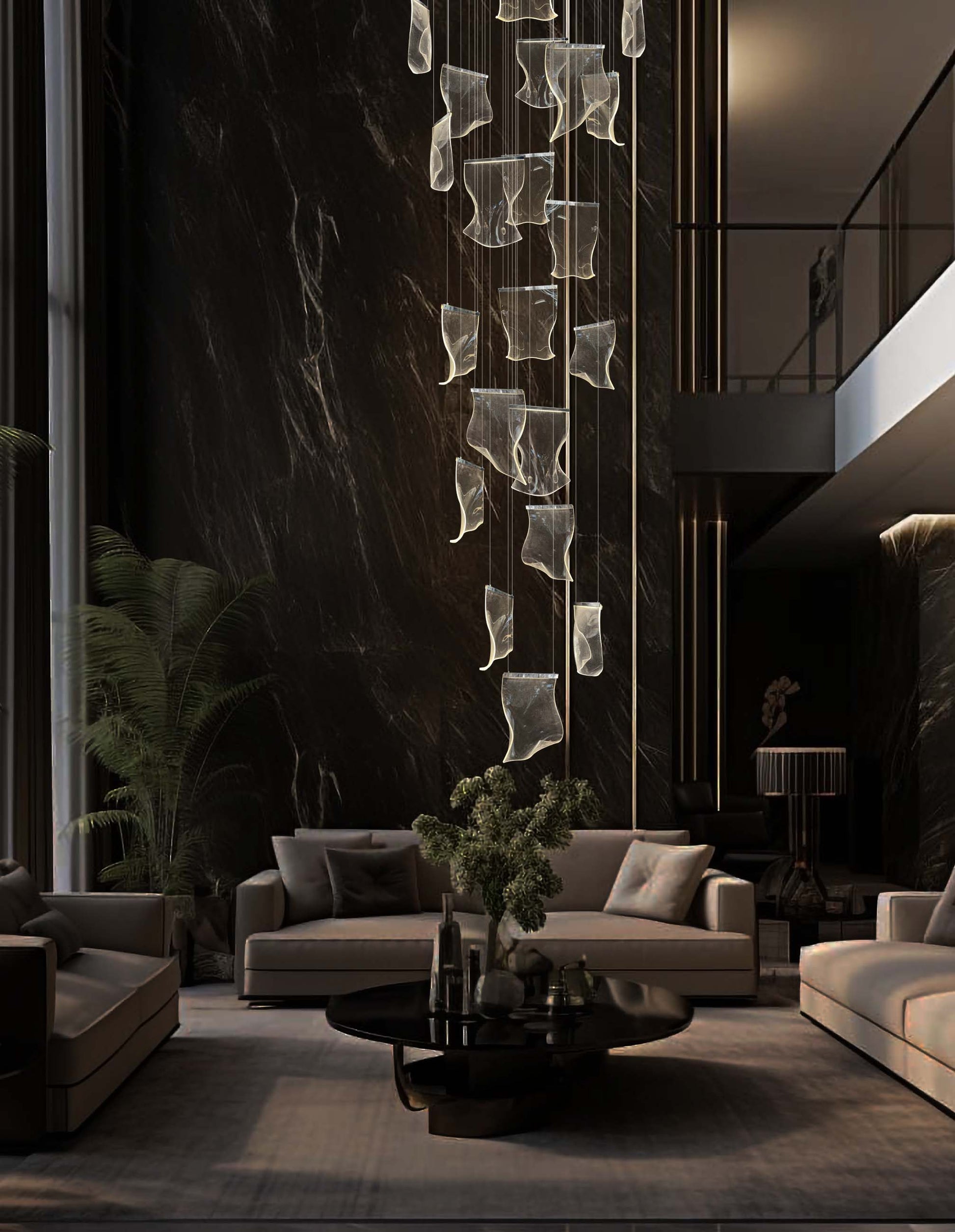 Adjustable and dimmable chrome chandelier with sculptural wave panels creating soft ambient lighting in a modern living room.