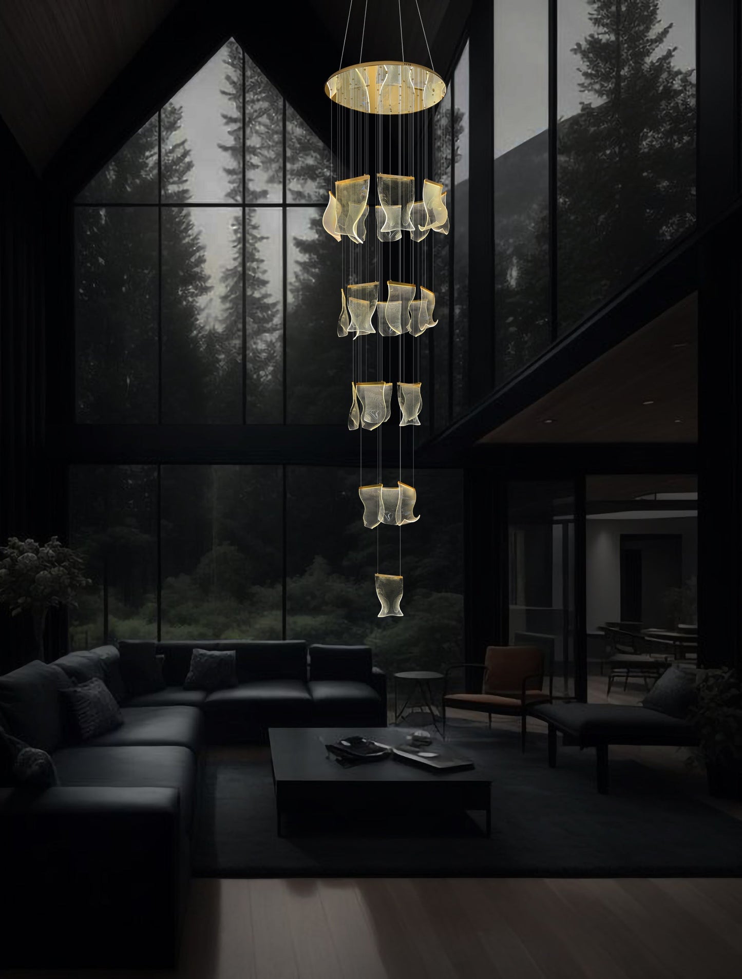 Adjustable LED wave chandelier with dimmable lighting suspended in a bright modern foyer with high ceilings.