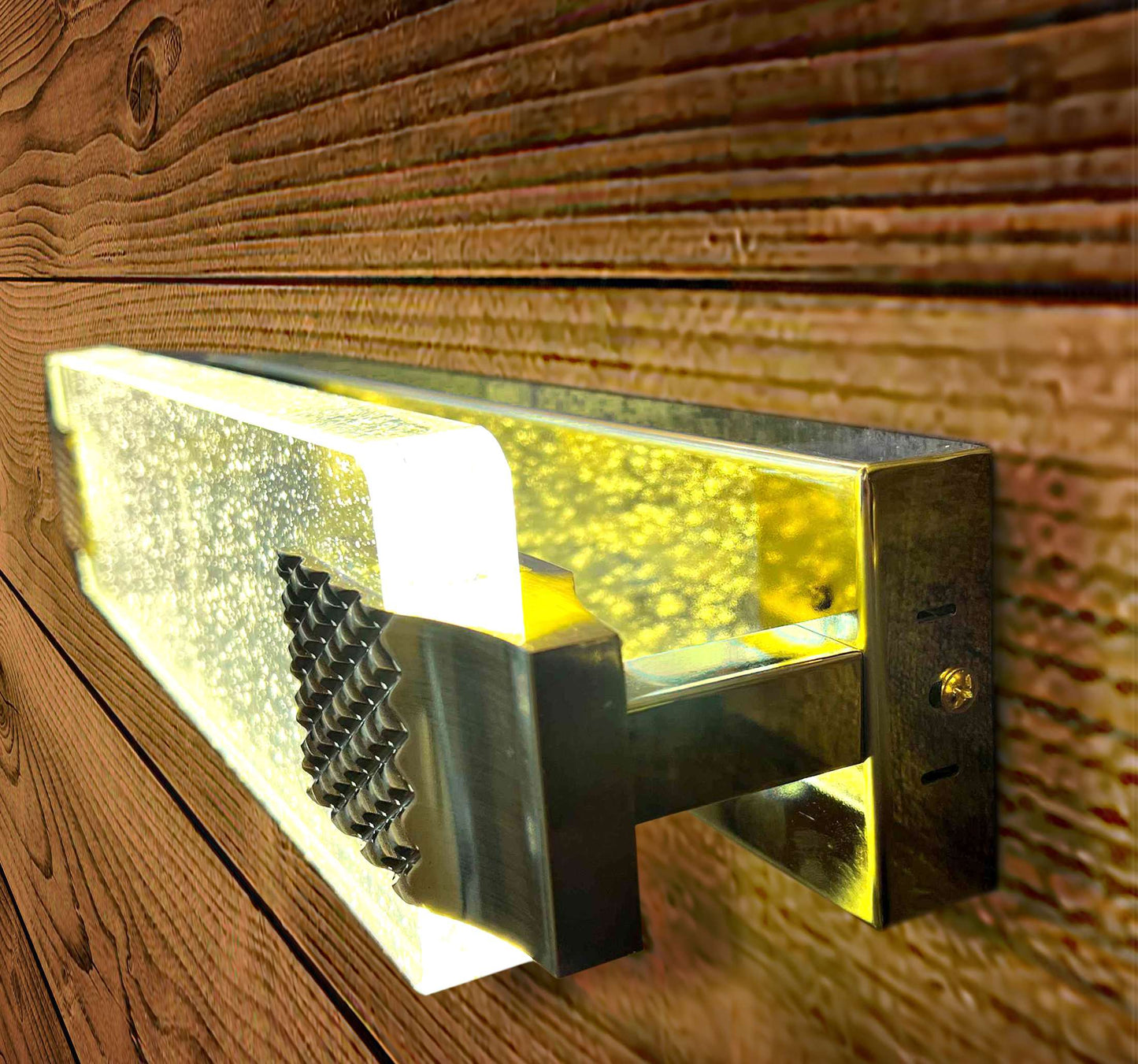 Close-up side angle of bubble glass LED wall sconce