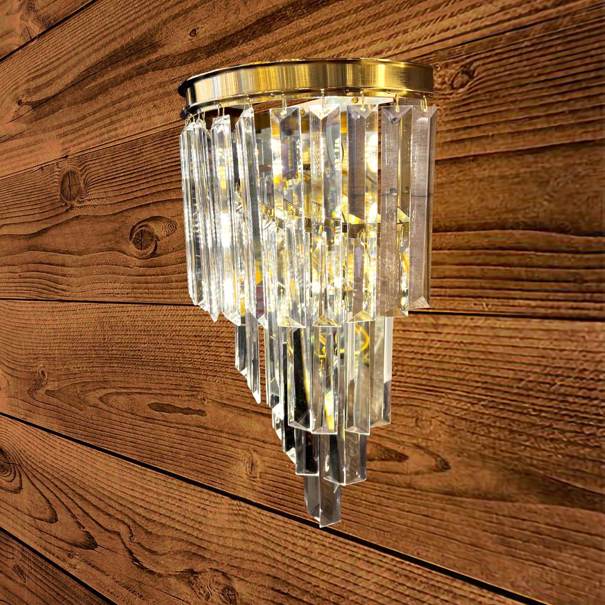 Crystal wall sconce on a wooden wall