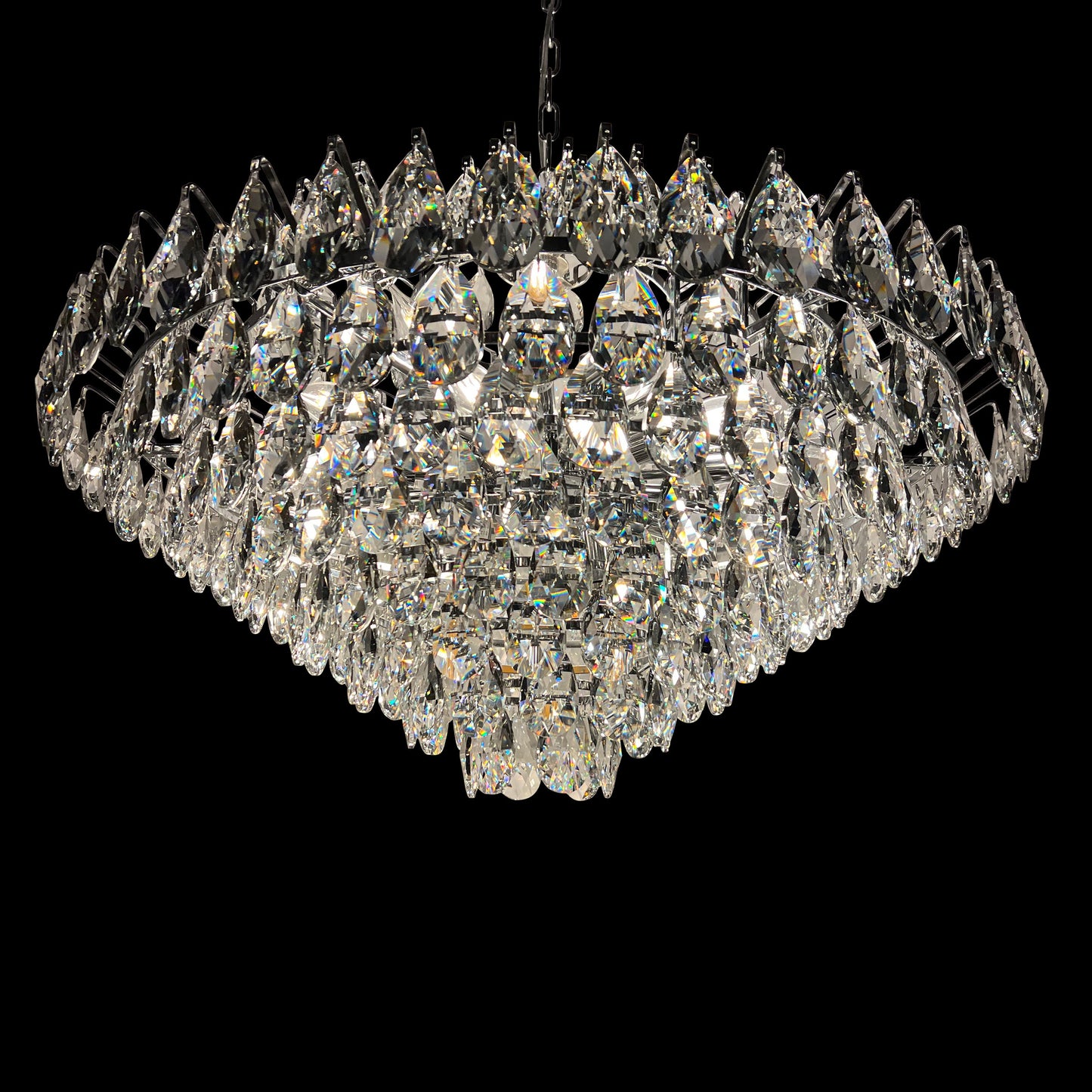 Close-up of 31 inch chrome crystal chandelier with teardrop crystals and empire style design