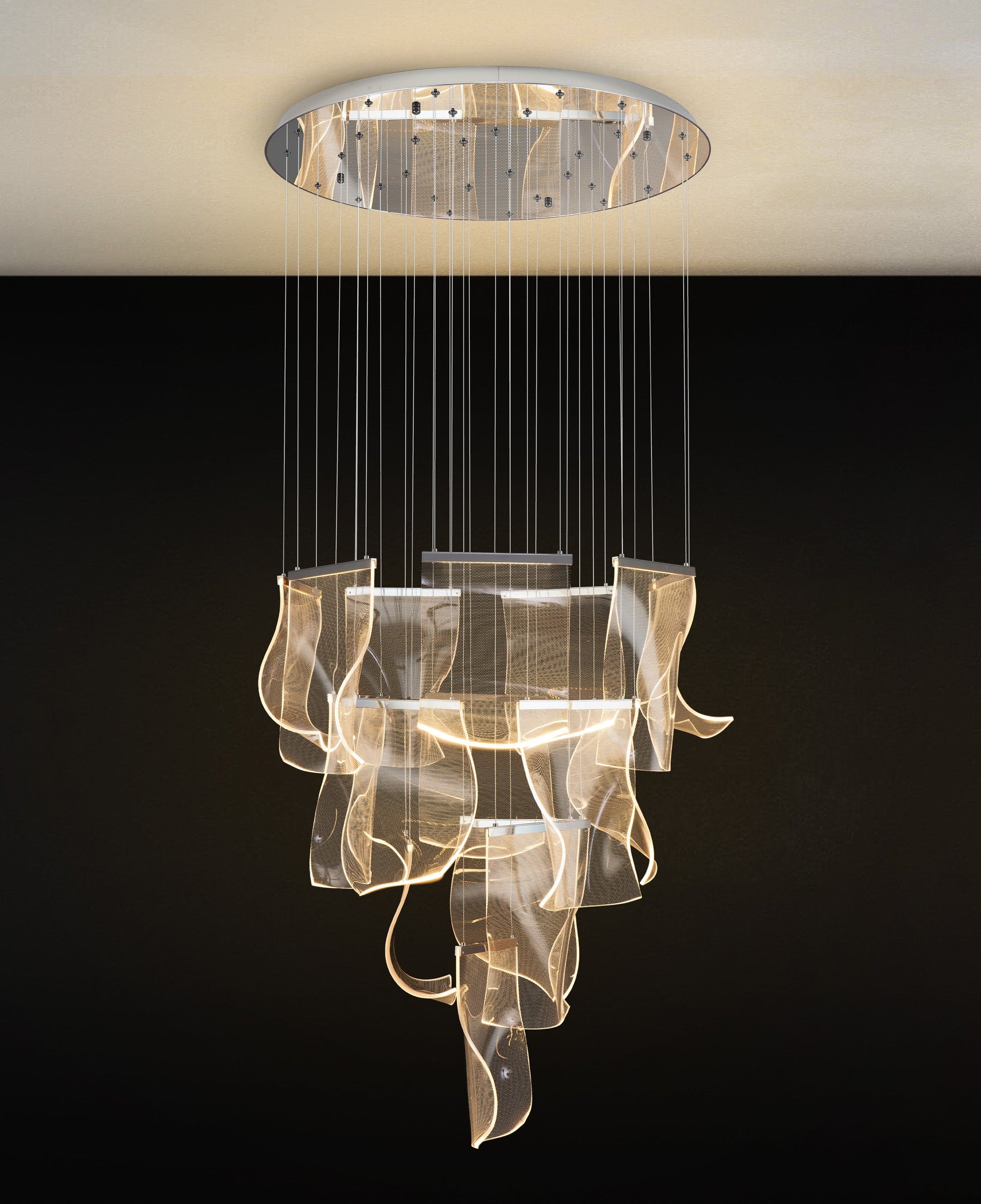 Close-up view of chrome LED wave panel chandelier showing cascading acrylic panels and modern reflective finish