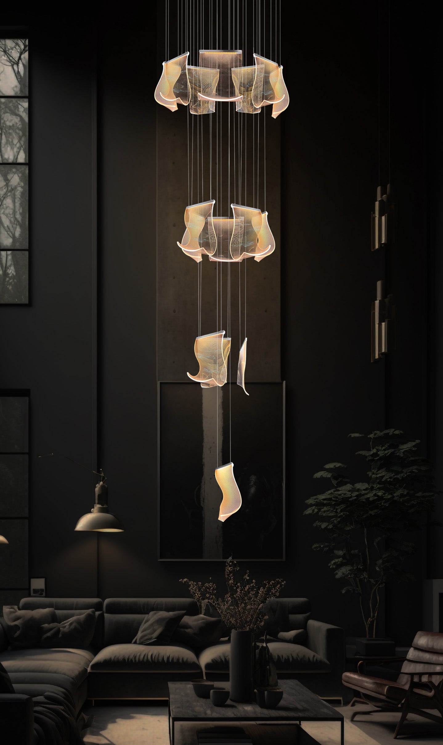 Modern chrome LED chandelier adjustable and dimmable  suspended above a contemporary coffee table in elegant dark décor.