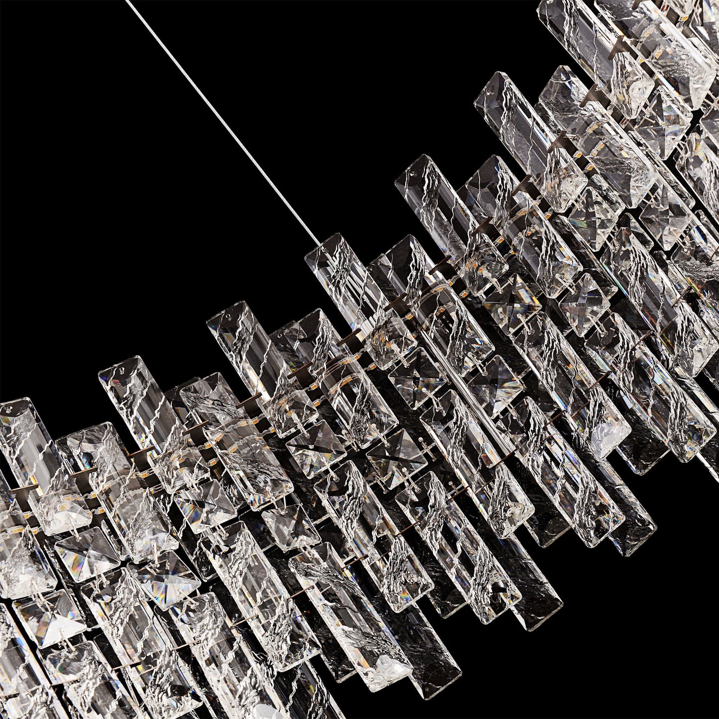 Chrome crystal chandelier detail highlighting reflective sparkle