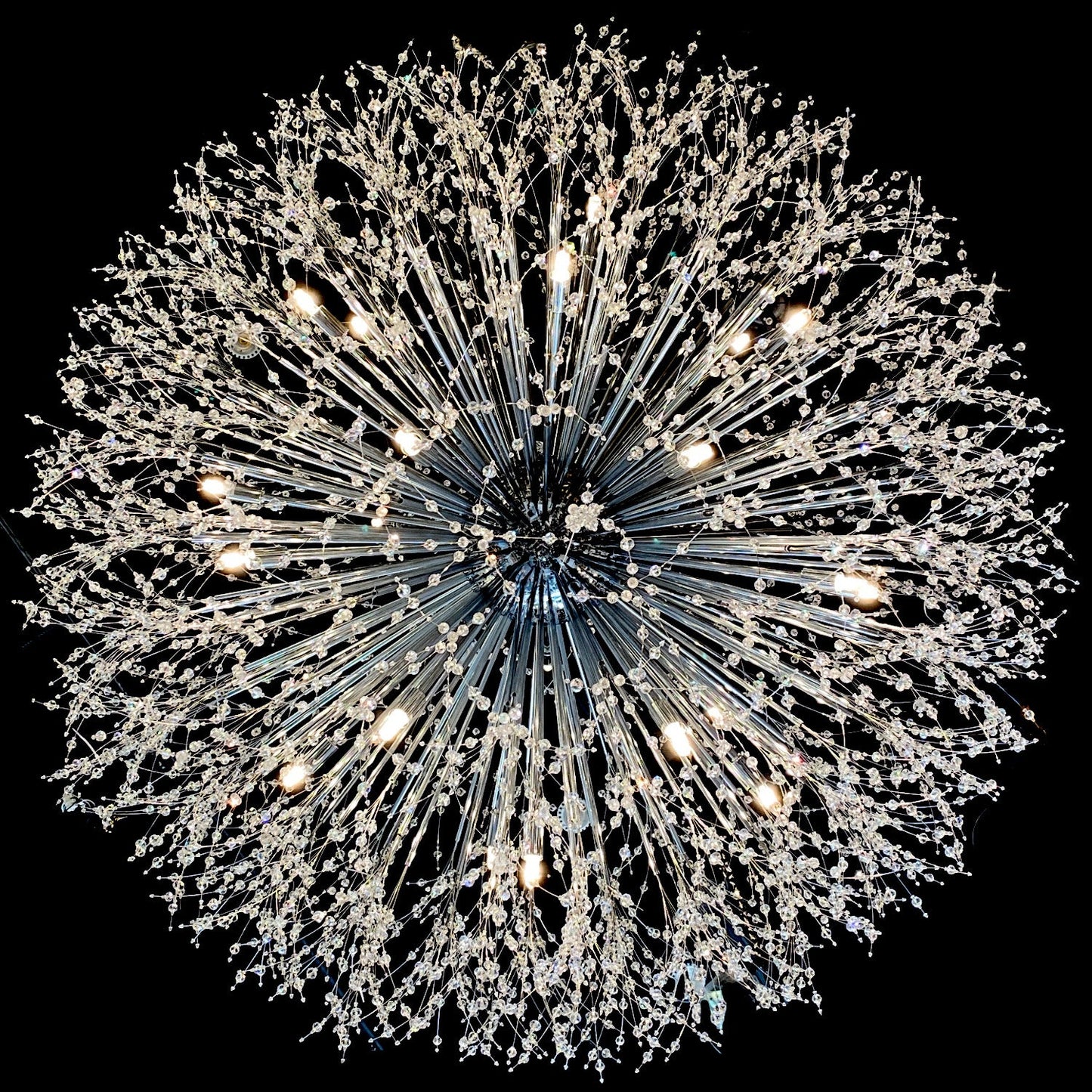 G4 halogen bulb warm white glow installed inn the starburst chandelier.