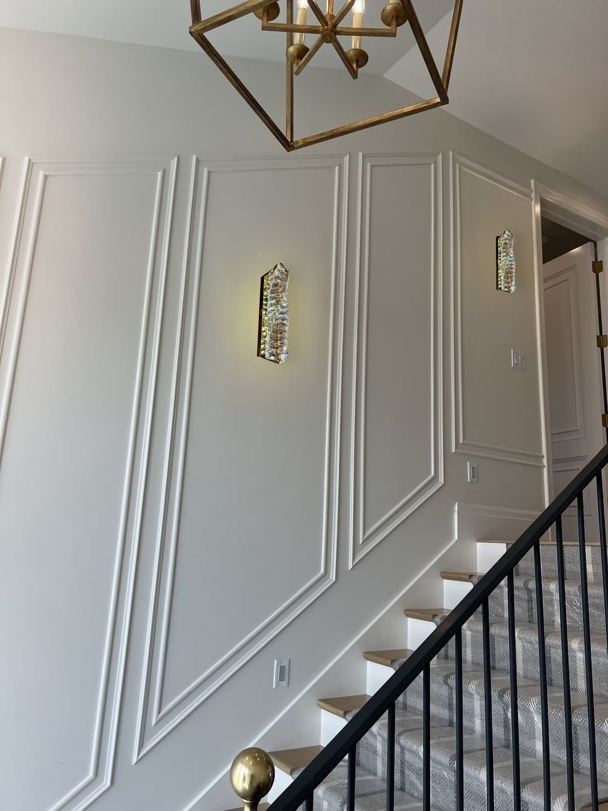 Modern gold crystal LED wall sconce in hallway decor
