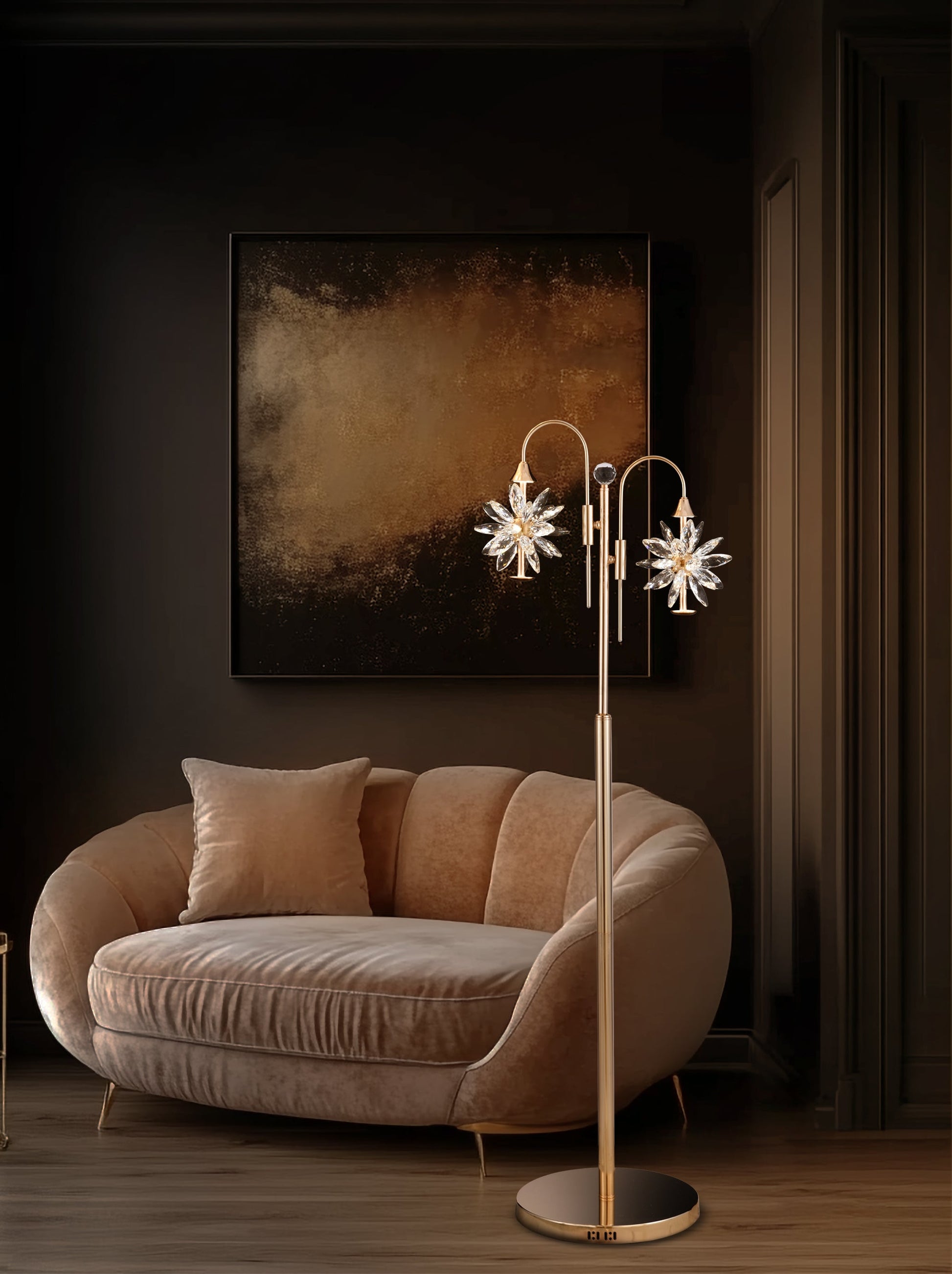 A luxurious gold LED floor lamp with a crystal starburst design, featuring a wide base and adjustable lighting colors, placed in a room with a sofa and a framed picture on the wall.
