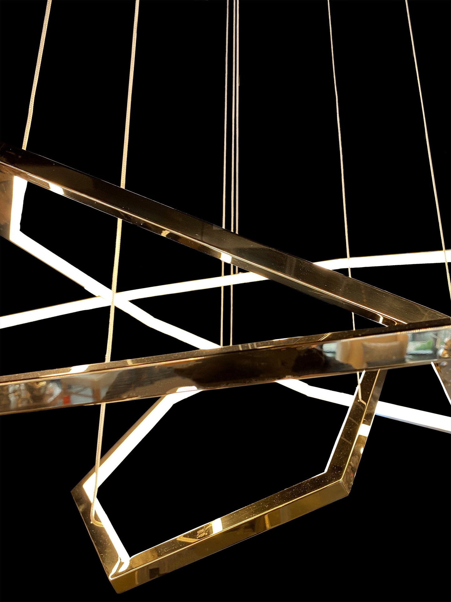 Gold adjustable geometric LED chandelier showing custom shape layout