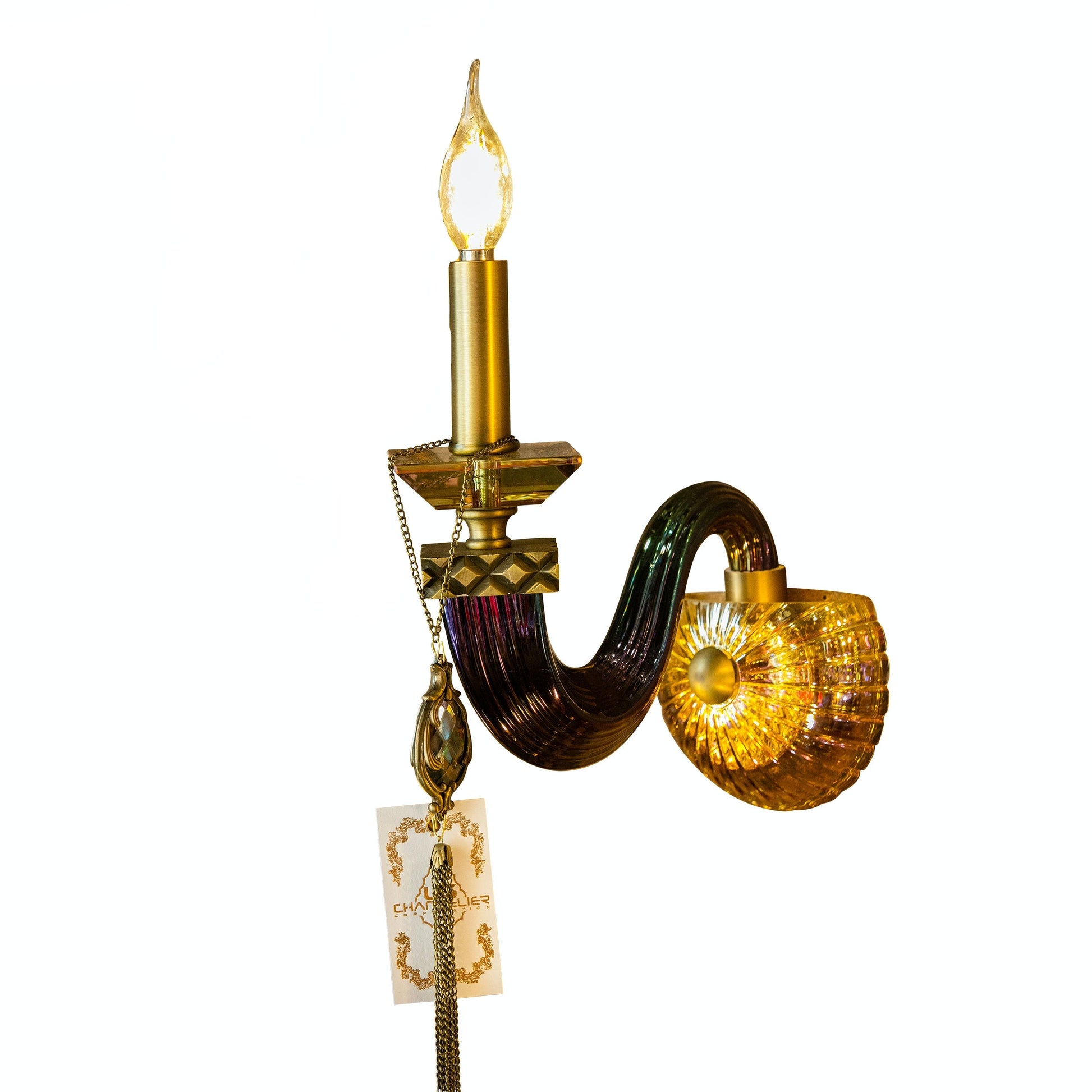A Handmade Italian Murano Glass Wall Sconce with a curved black glass arm and gold-accented crystal base, featuring a candle-style bulb.