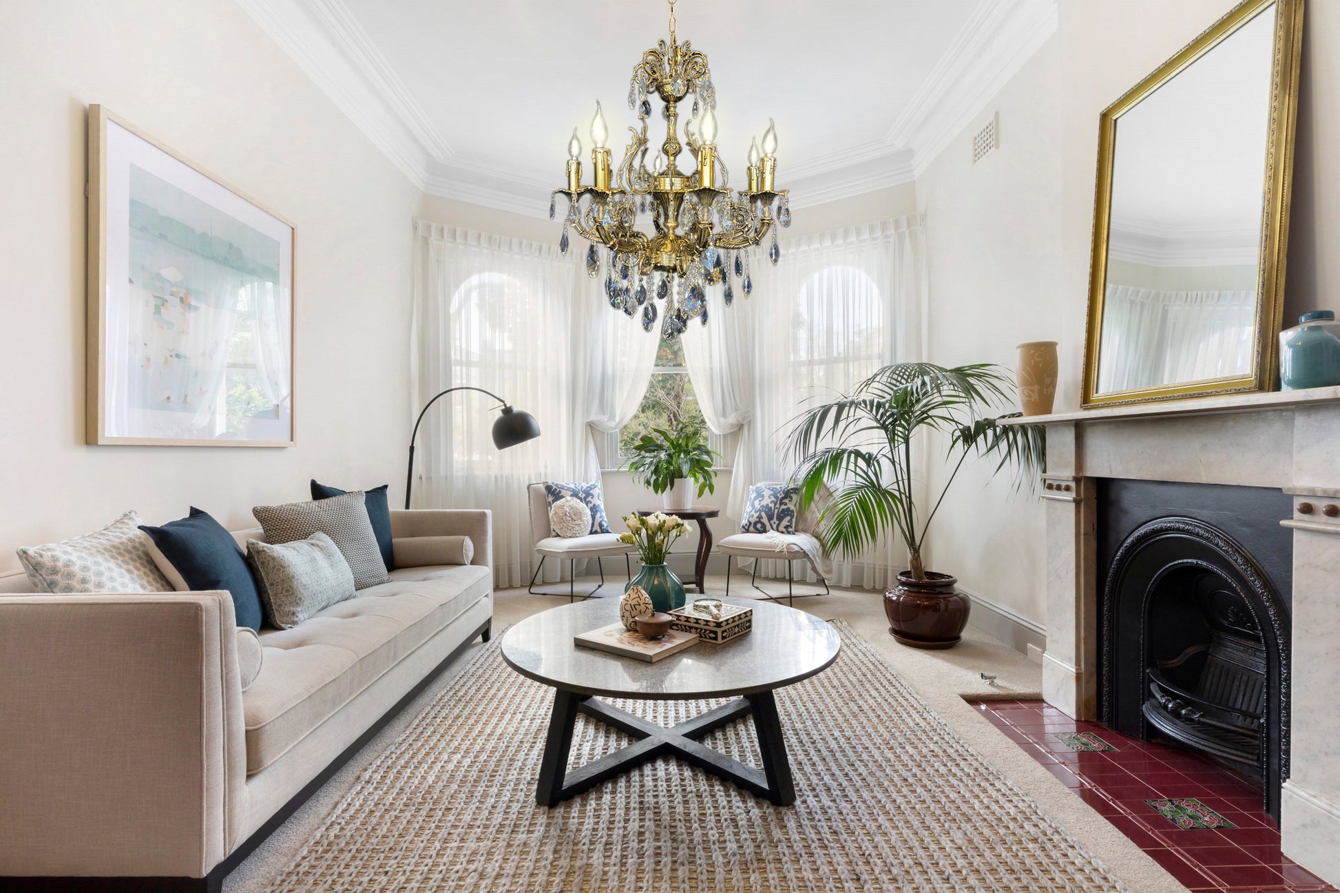  Italian handcrafted chandelier adding luxury to classic family room design
