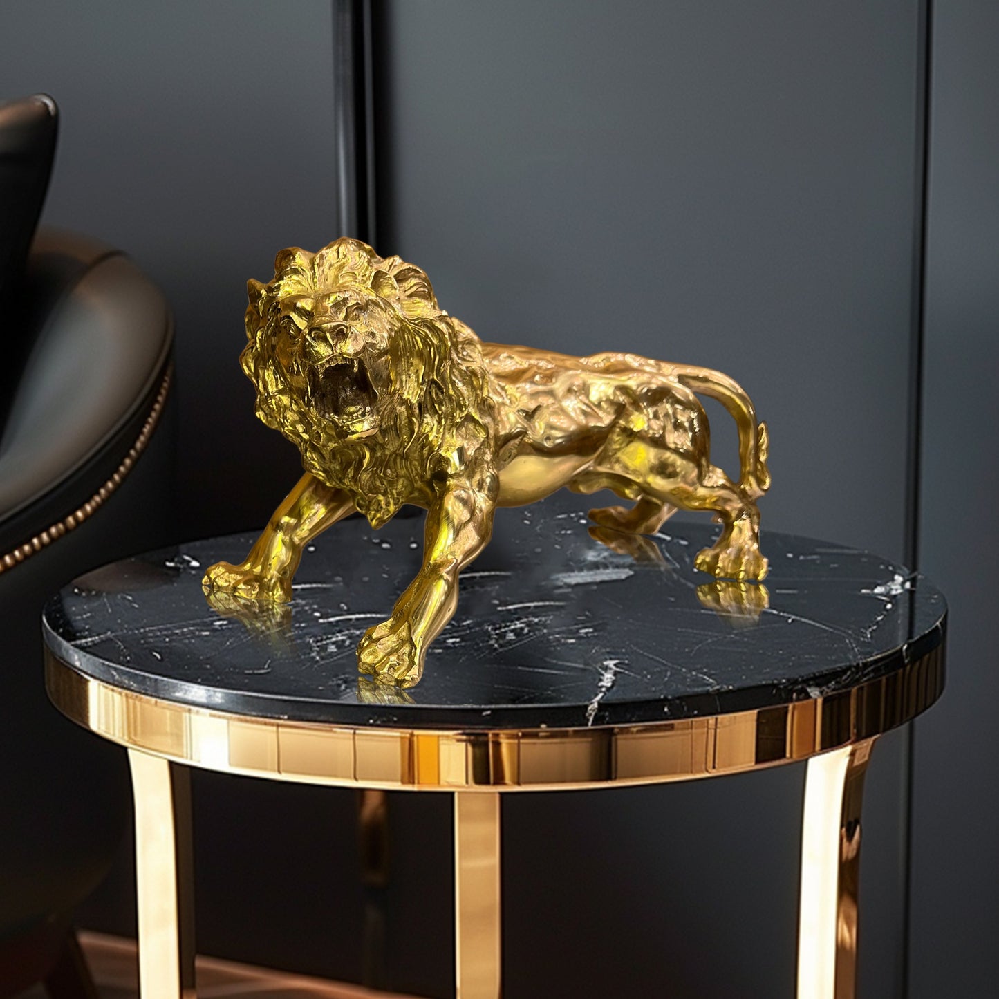  Handcrafted Italian solid brass lion statue in a powerful walking pose with gold finish.