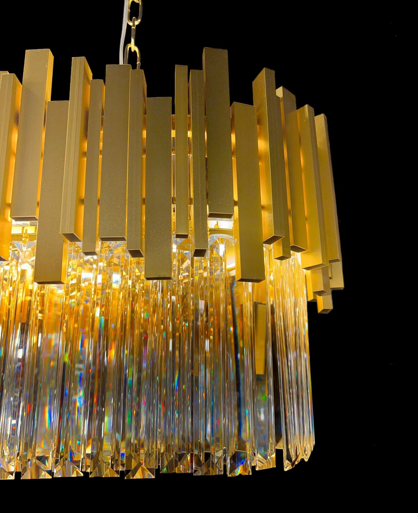 Bottom perspective of the gold linear chandelier with crystal details