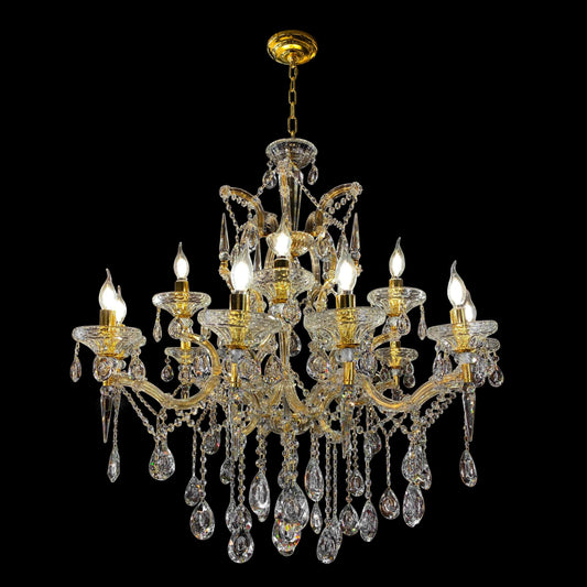 A luxurious gold-finished Maria Theresa crystal chandelier with glass arms and hanging crystal drops.