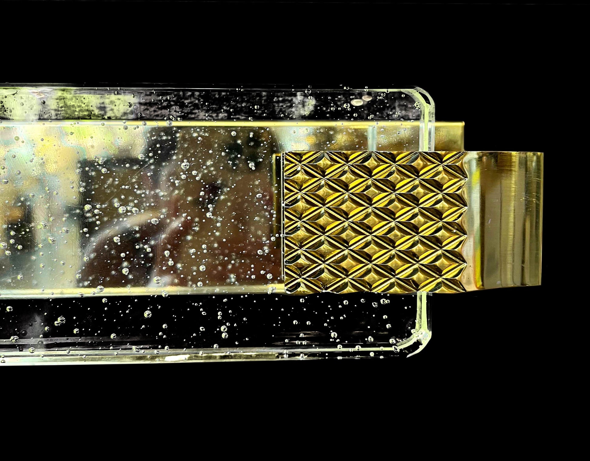 Illuminated bubble glass panel on modern LED wall sconce