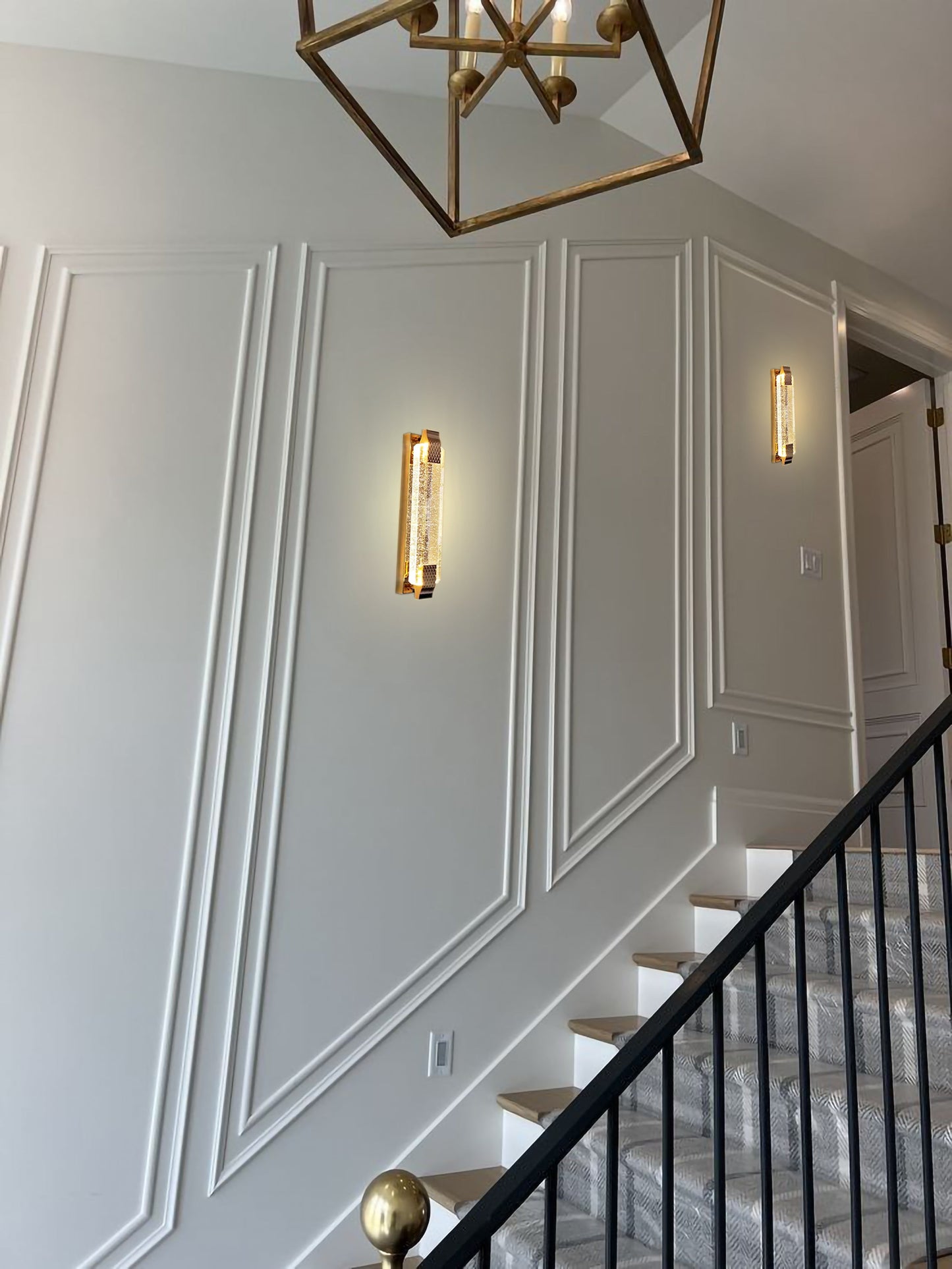 Bubble glass LED wall sconce installed in hallway