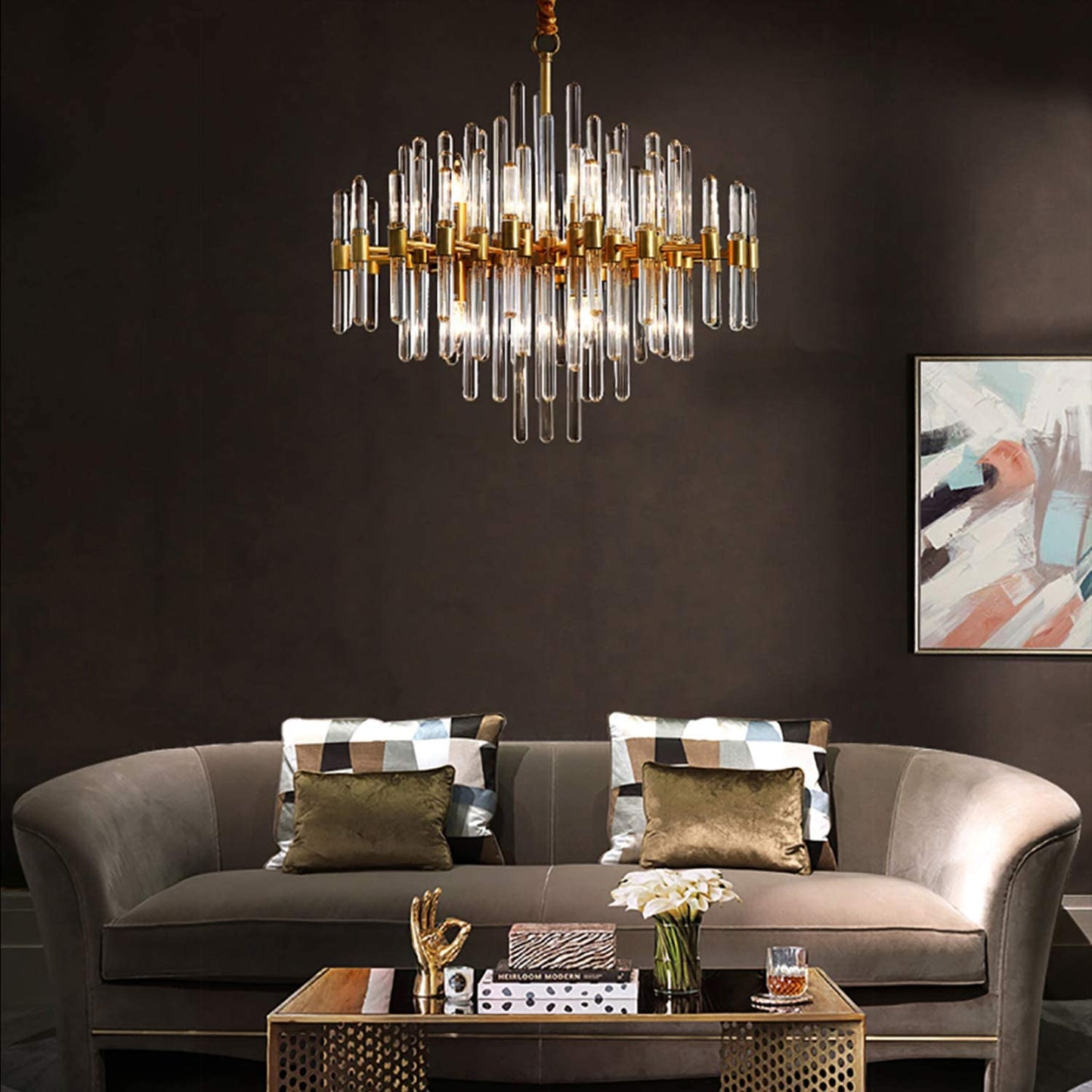 Modern gold glass rod chandelier in upscale living room setting