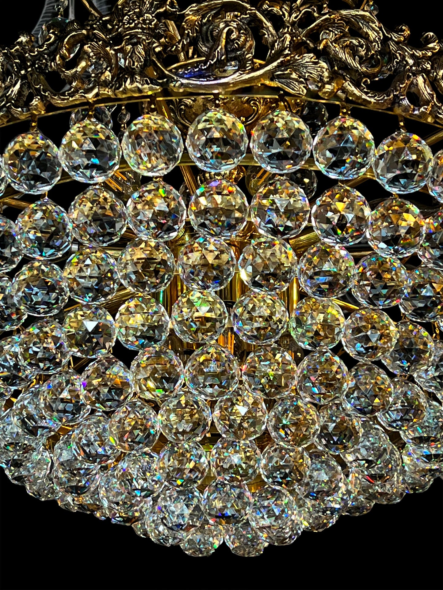 Close-up of handcrafted crystal layers reflecting warm golden light