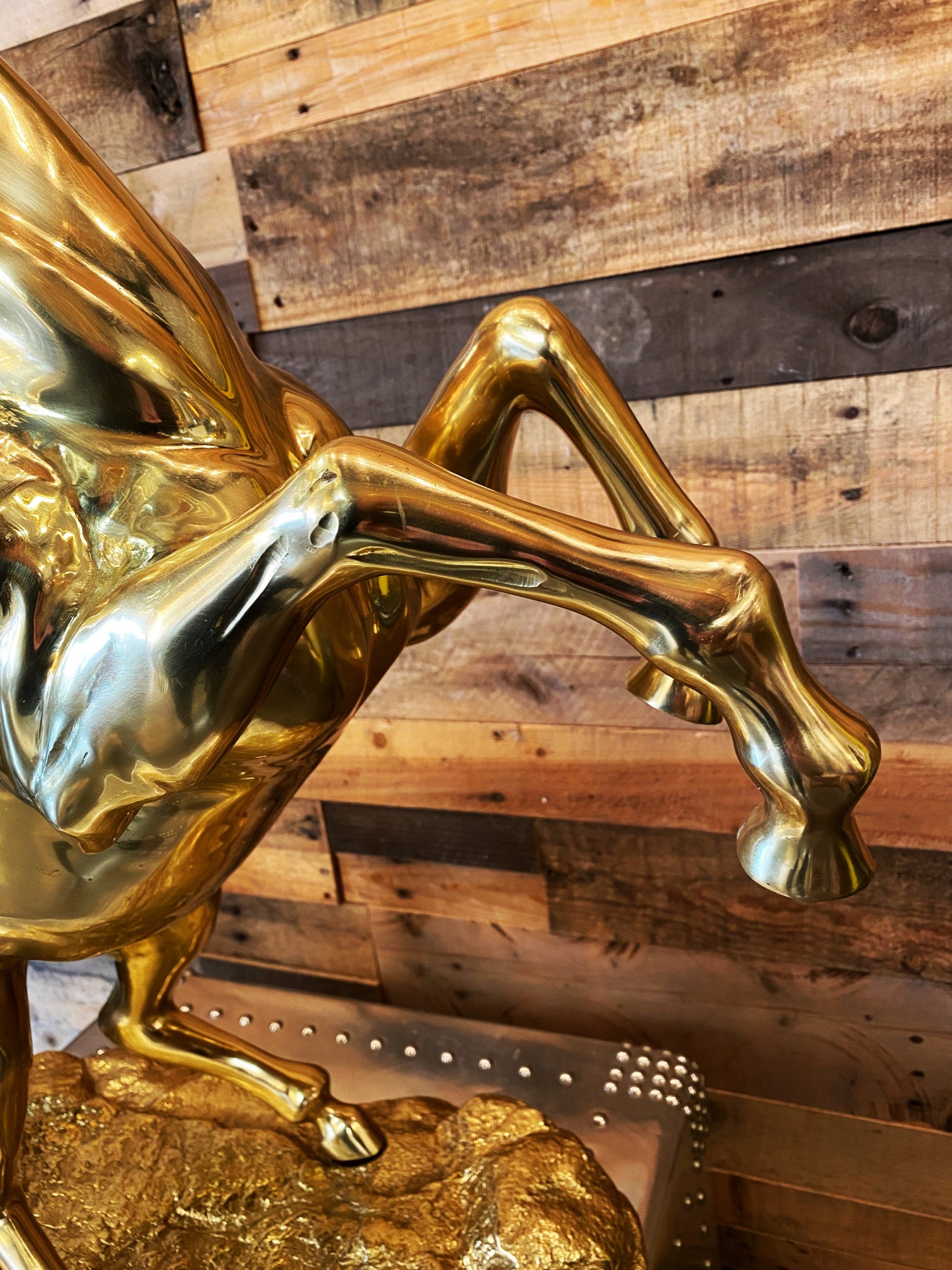 * Precision detailing of the rearing horse's hooves and legs, handcrafted in Italy from 100% pure solid brass.