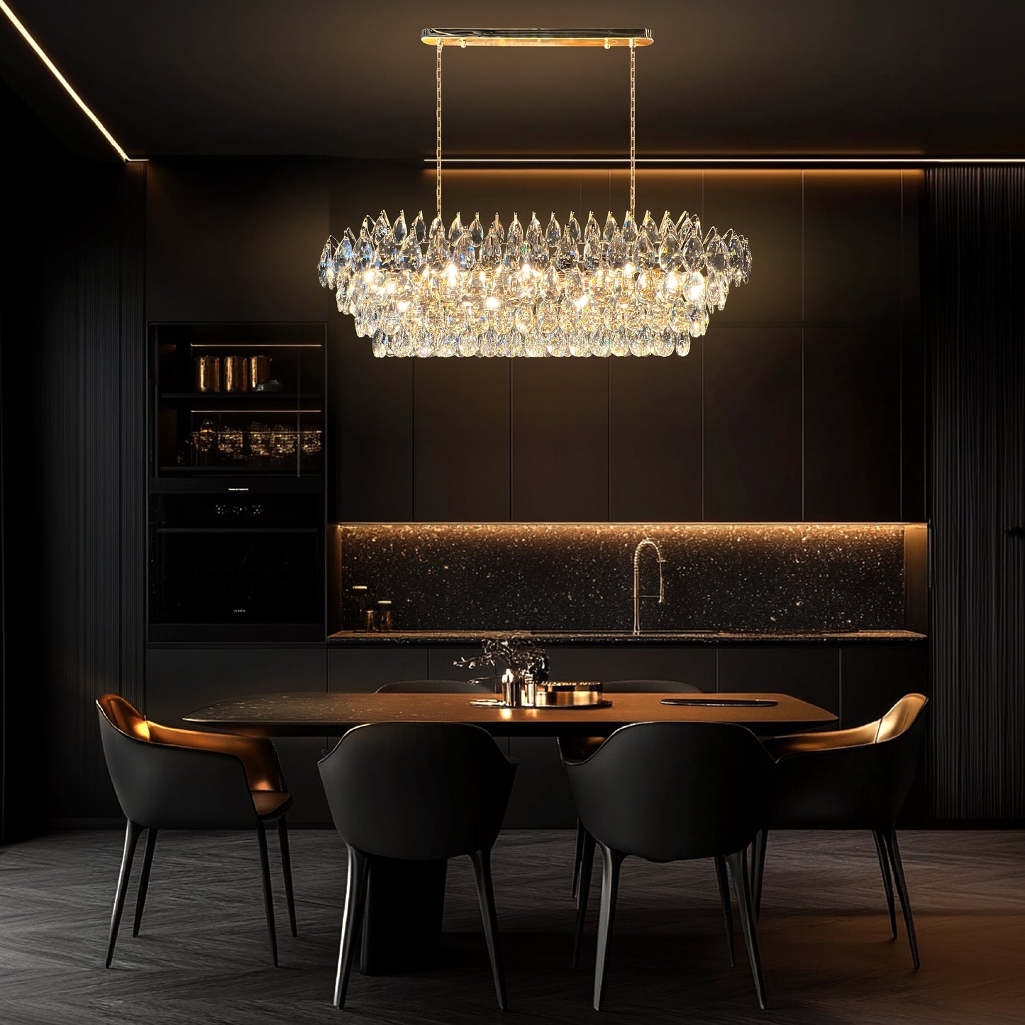 Luxury champagne gold rectangular crystal chandelier with cascading K9 teardrop crystals and a polished linear design, glowing with warm golden light.