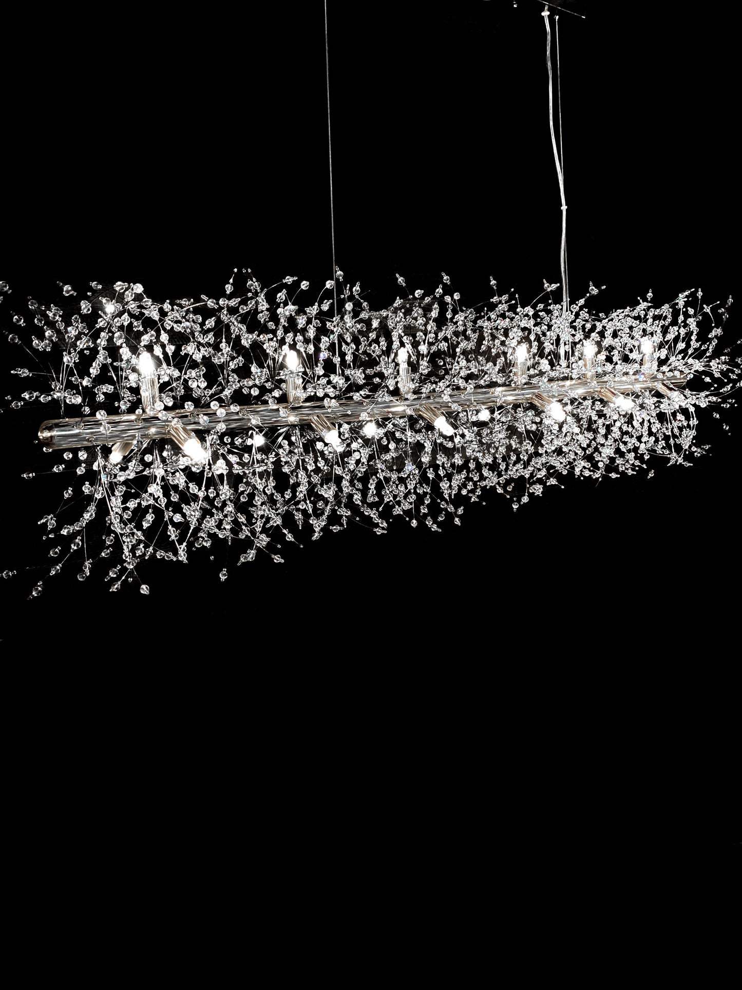 Close-up of starburst crystal branches with chrome finish