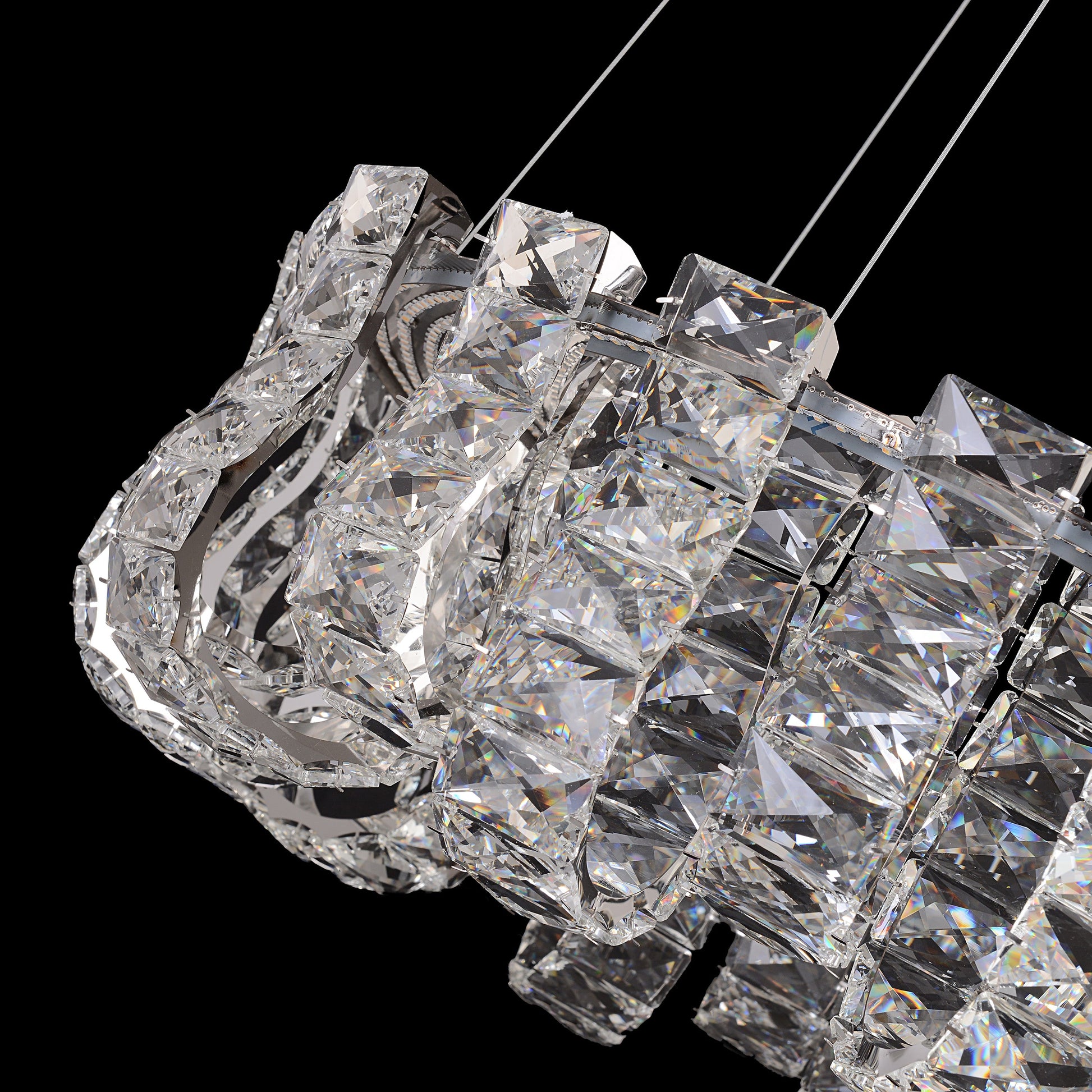 Close-up view of premium K9 crystal detailing on the luxury chrome chandelier showing clarity and brilliance.