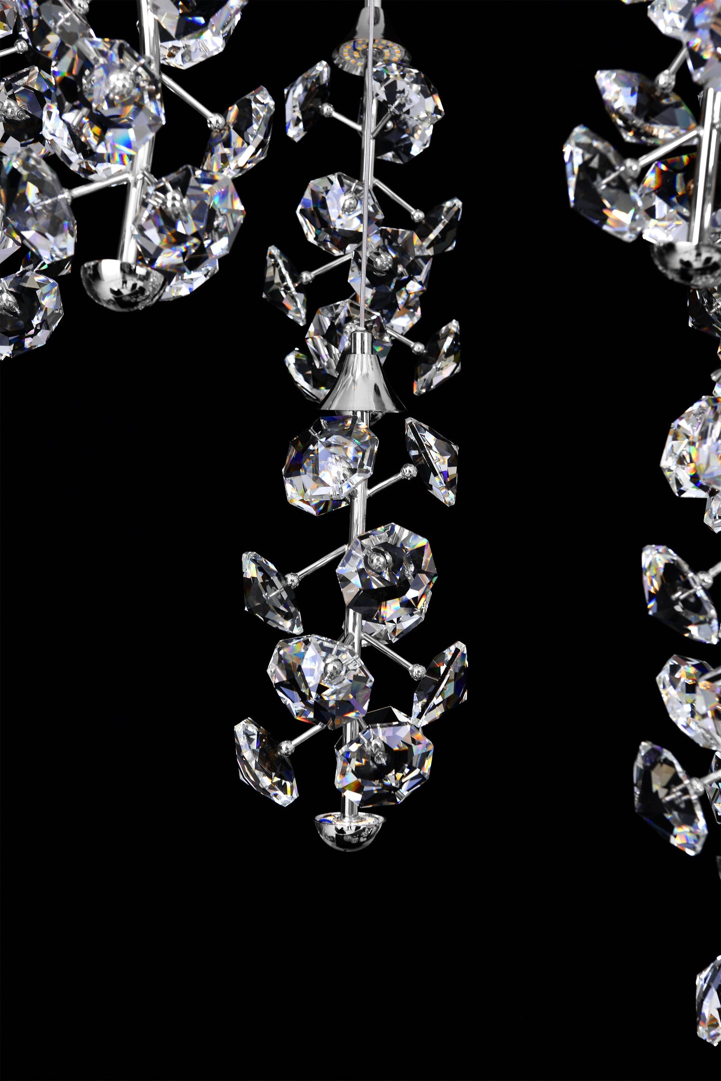 Close-up of crystal clusters on modern LED cascading chandelier