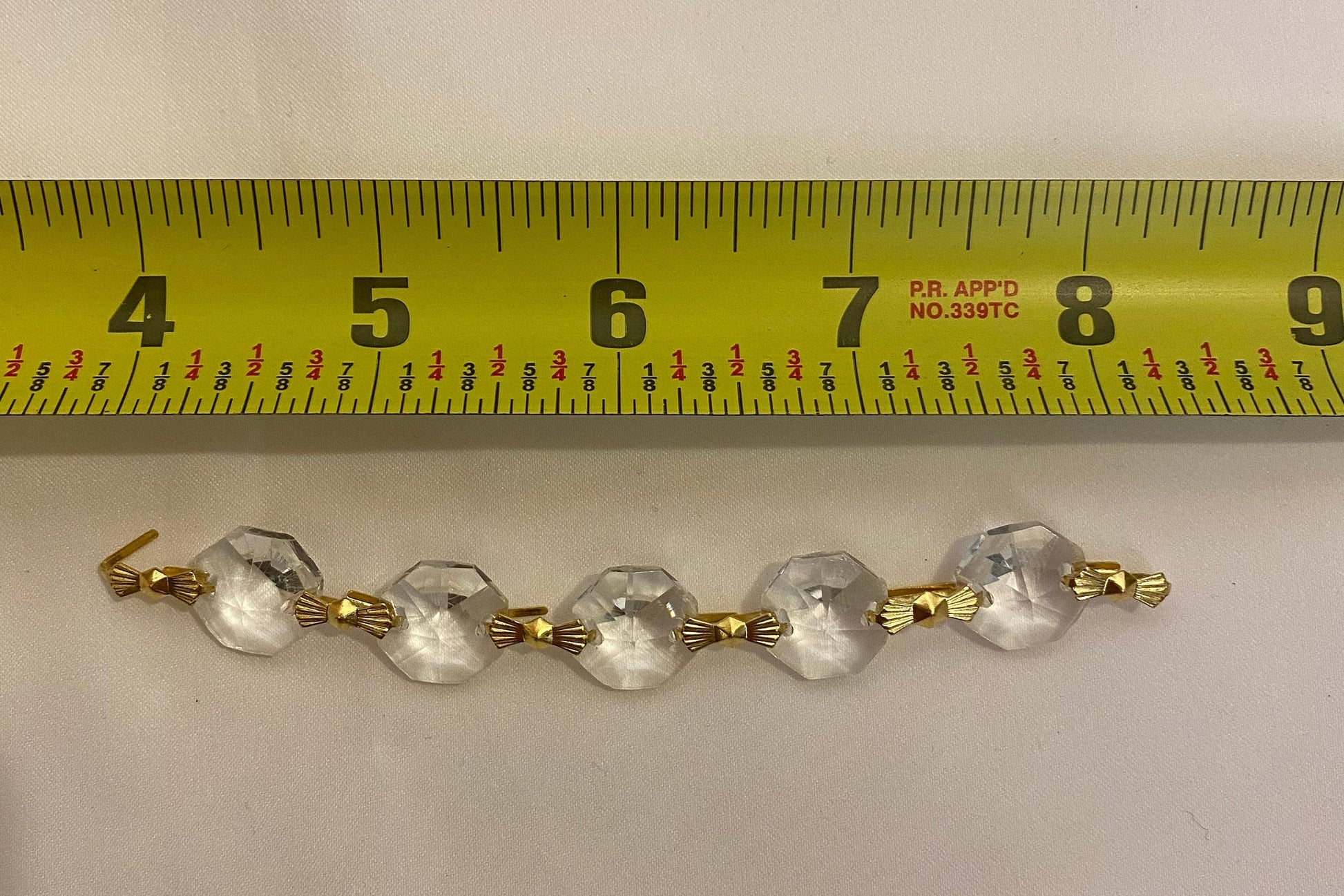 Crystal strand length measurement for chandelier restoration