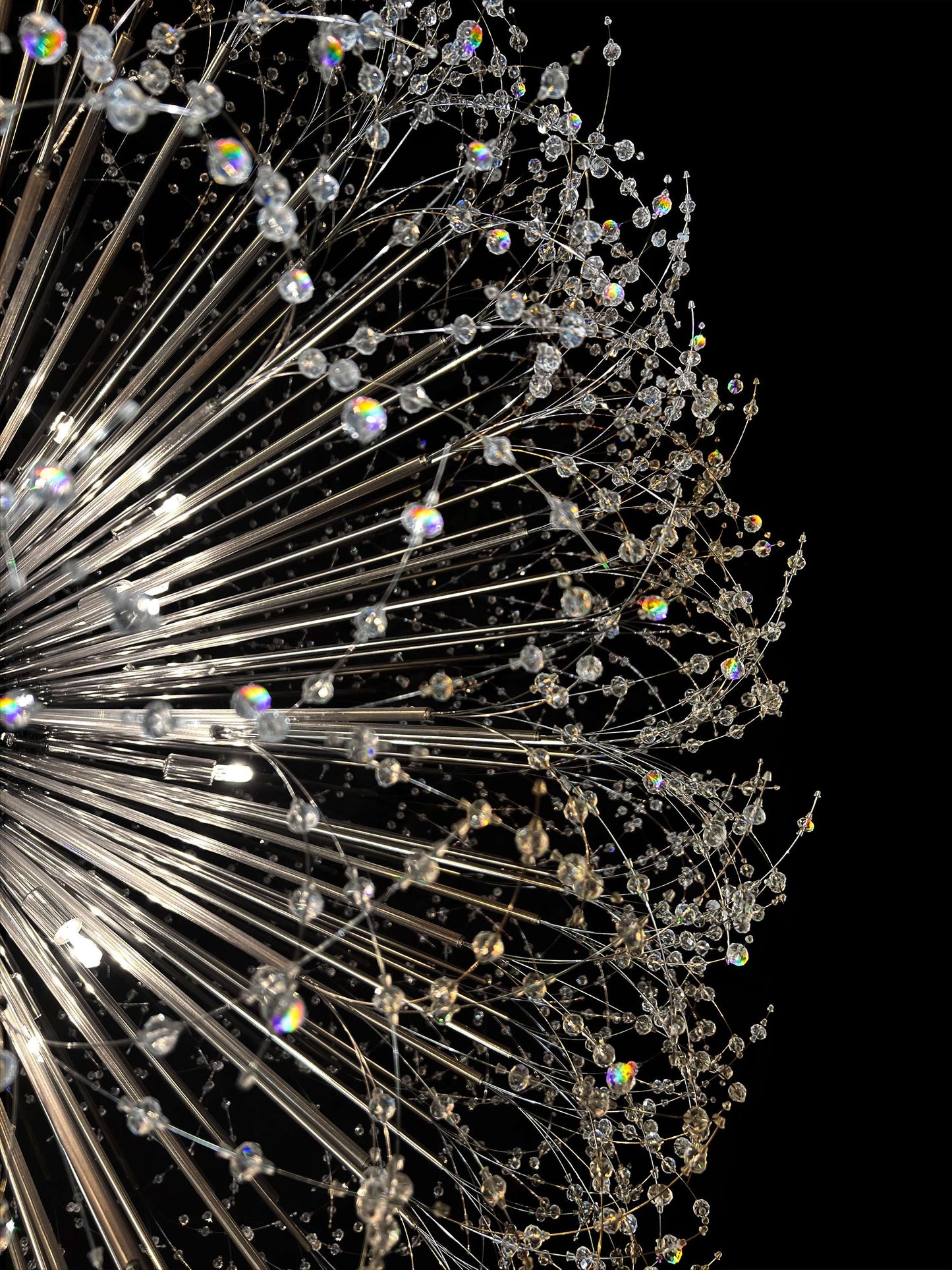 Dimmable chandelier close-up showing precision-cut crystal branches