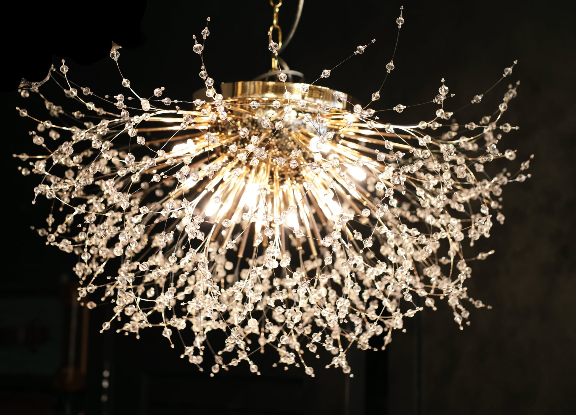 Dimmable gold chandelier featuring G9 LED bulbs and sparkling crystals