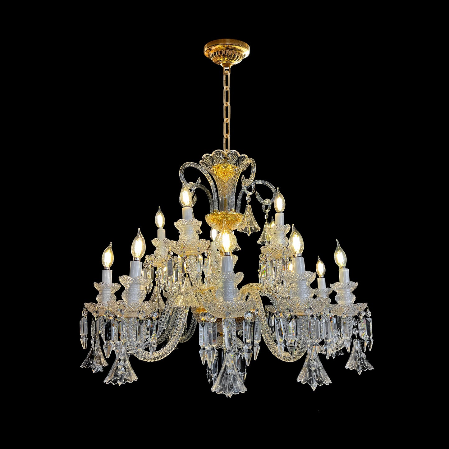 Gold Baroque style crystal chandelier with 15 lights on a black background.