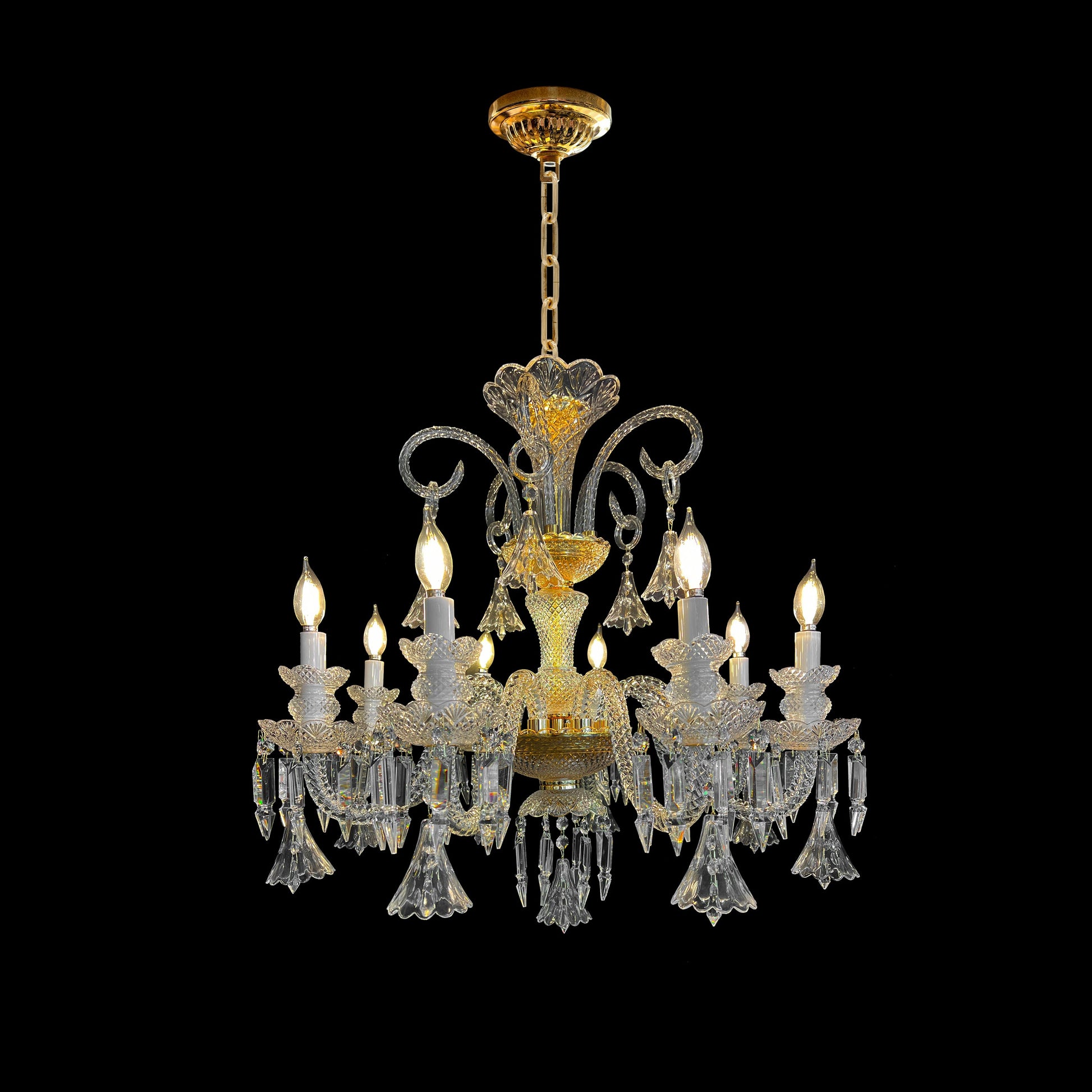 Gold Baroque style crystal chandelier with 8 lights on a black background.
