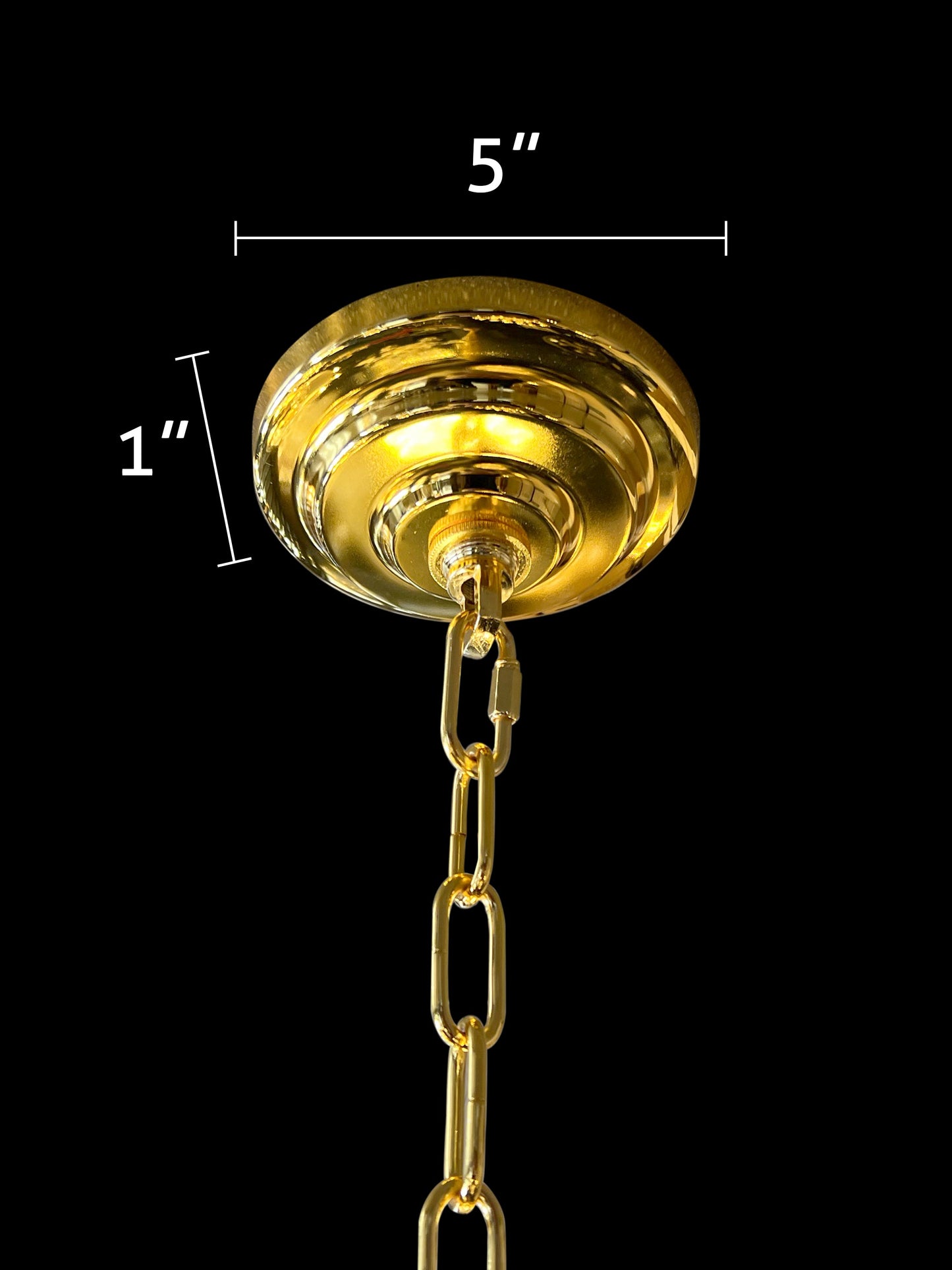 Close-up of gold chandelier canopy and adjustable hanging chain detail.