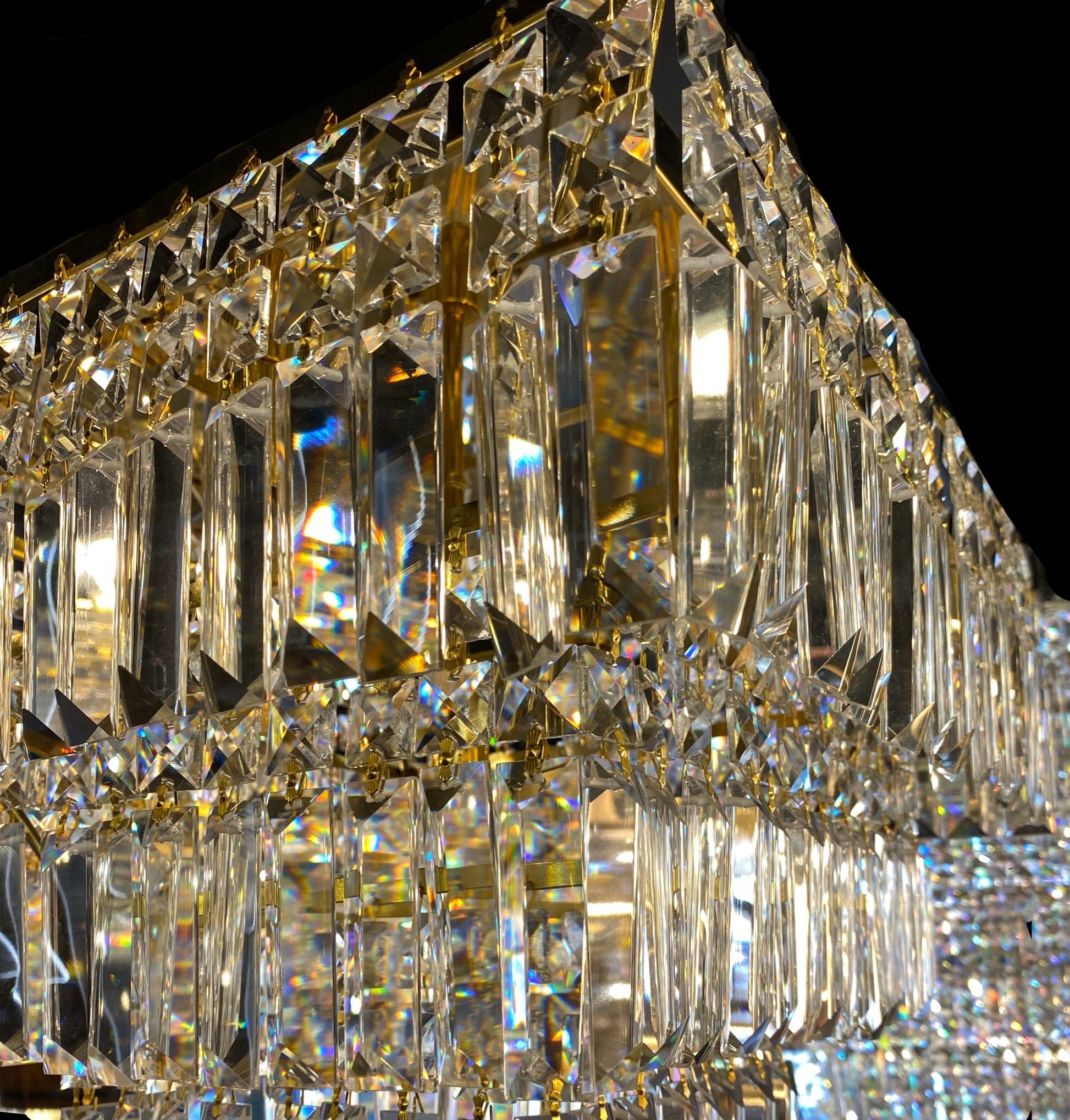 Close up detail of gold crystal chandelier premium prisms