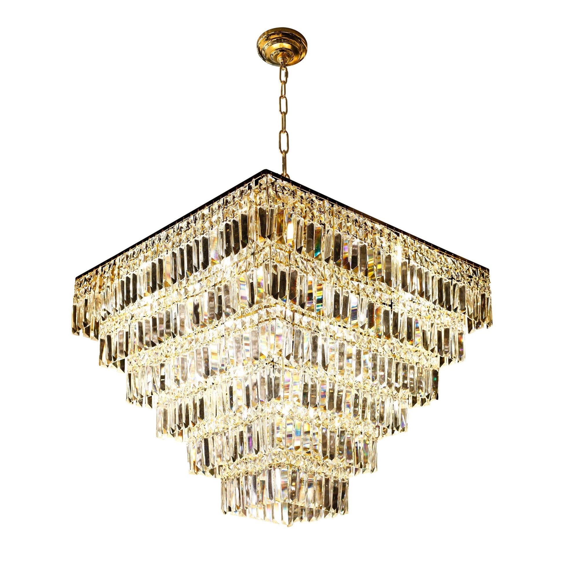 Elegant tiered gold crystal chandelier in luxury interior setting