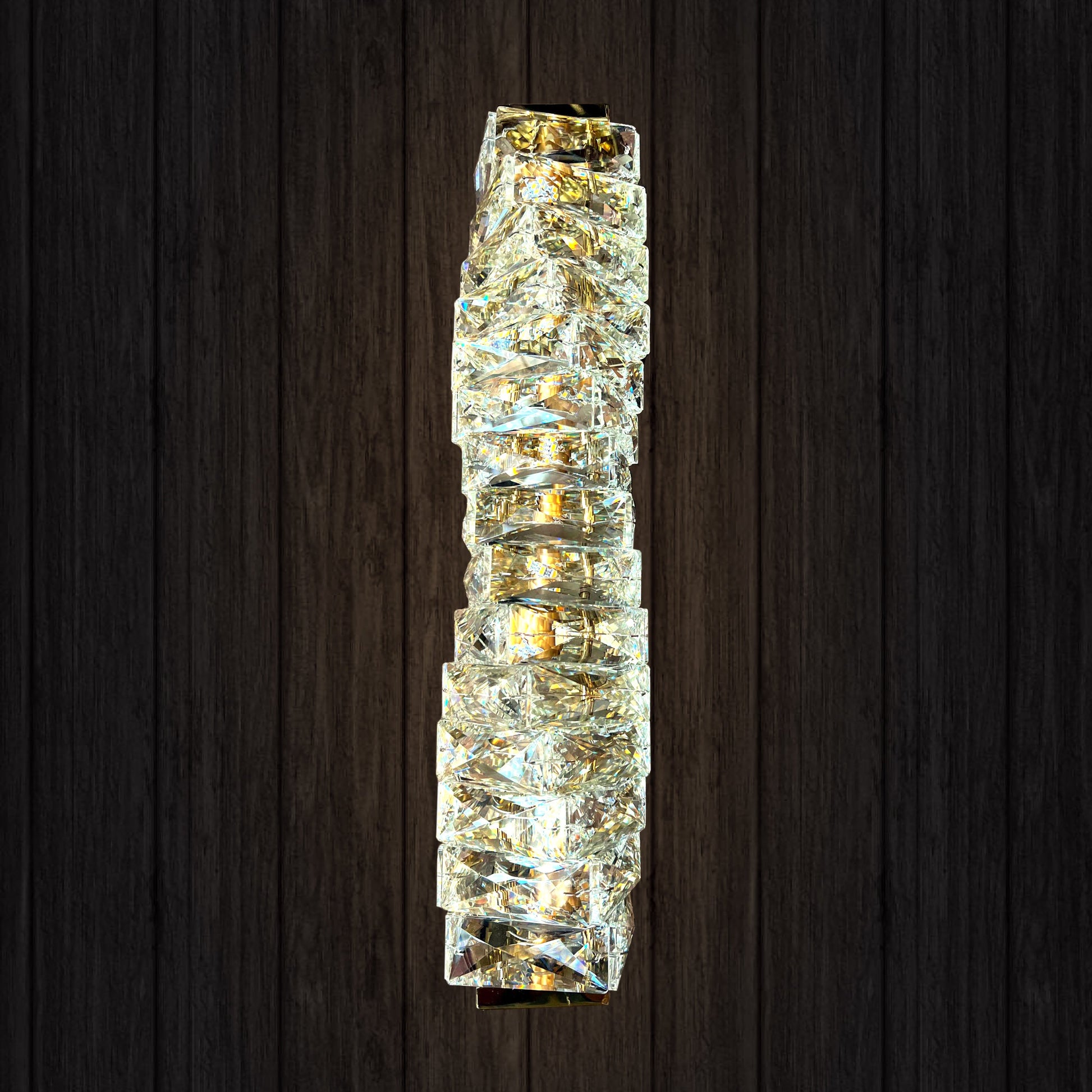 Crystal wall sconce on a dark wooden background
