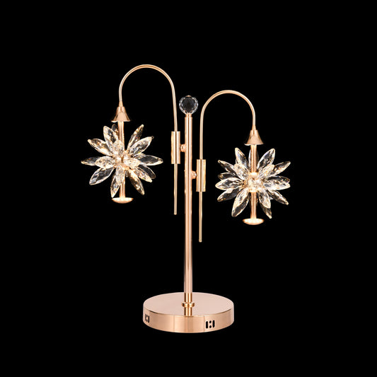 A gold-finished, stainless steel LED table lamp with two crystal starburst-shaped shades, designed for home and office decor.