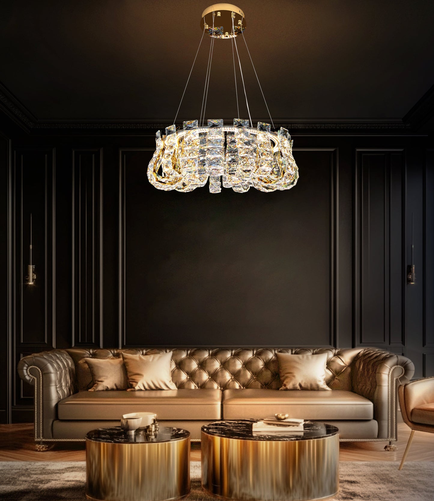 Gold crystal LED chandelier illuminating a luxury living room with modern gold décor and dark walls.
