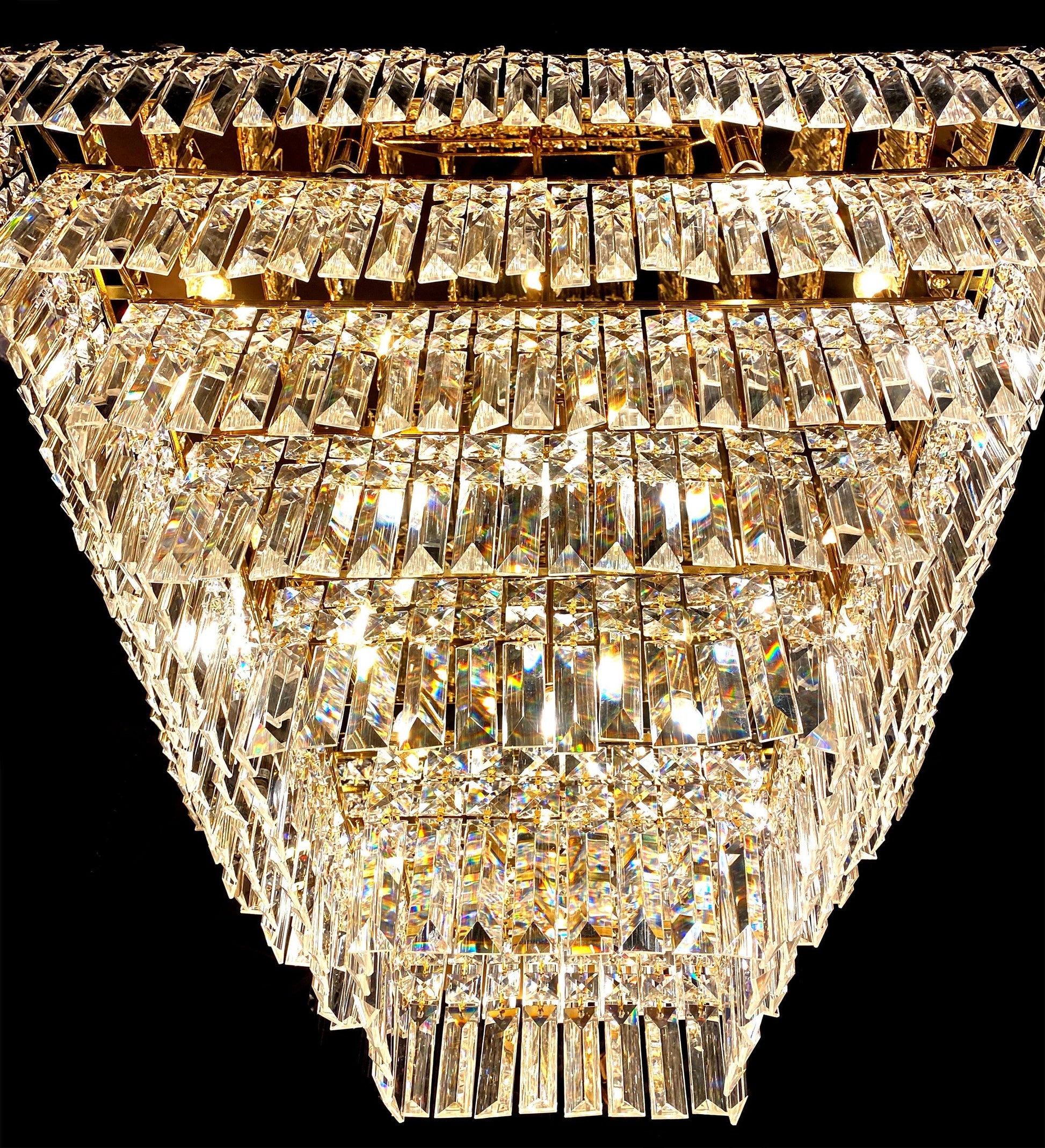 Clear lead crystal prism detail on gold tiered chandelier