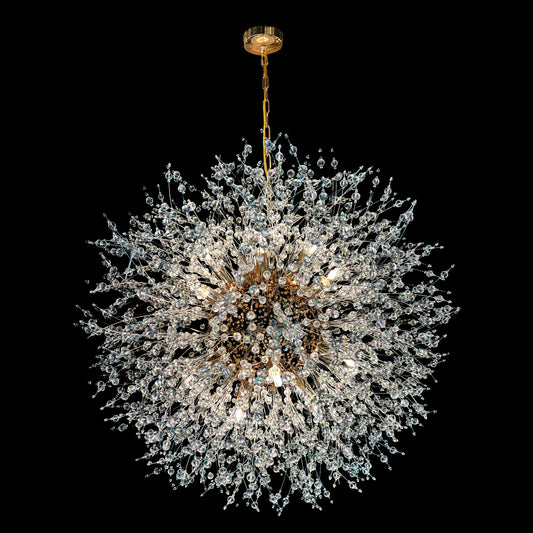 A 24-inch gold crystal chandelier with a starburst design, featuring nano-cut crystal beads and a central gold fixture, hanging from a gold chain.