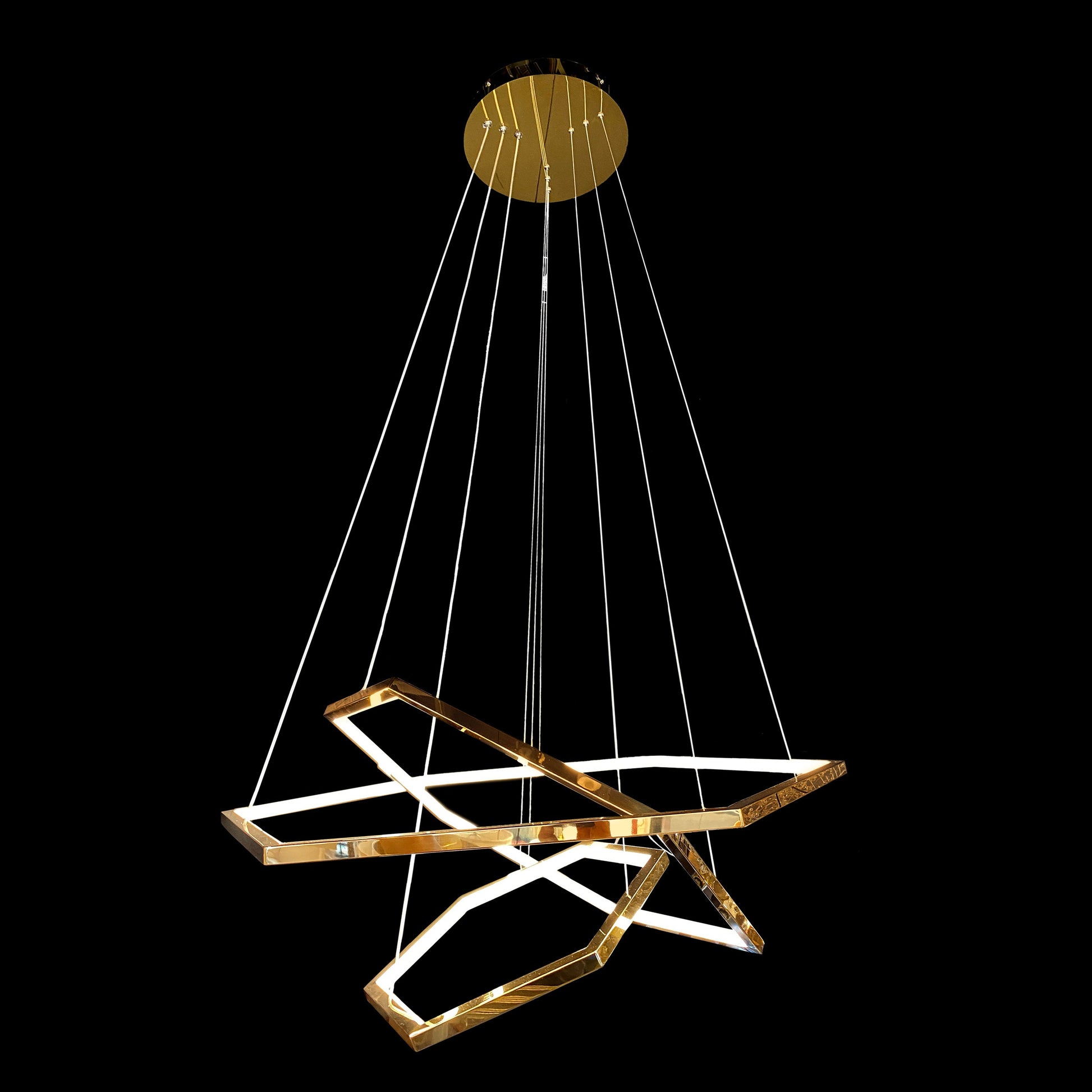 Gold chandelier with geometric design on a black background