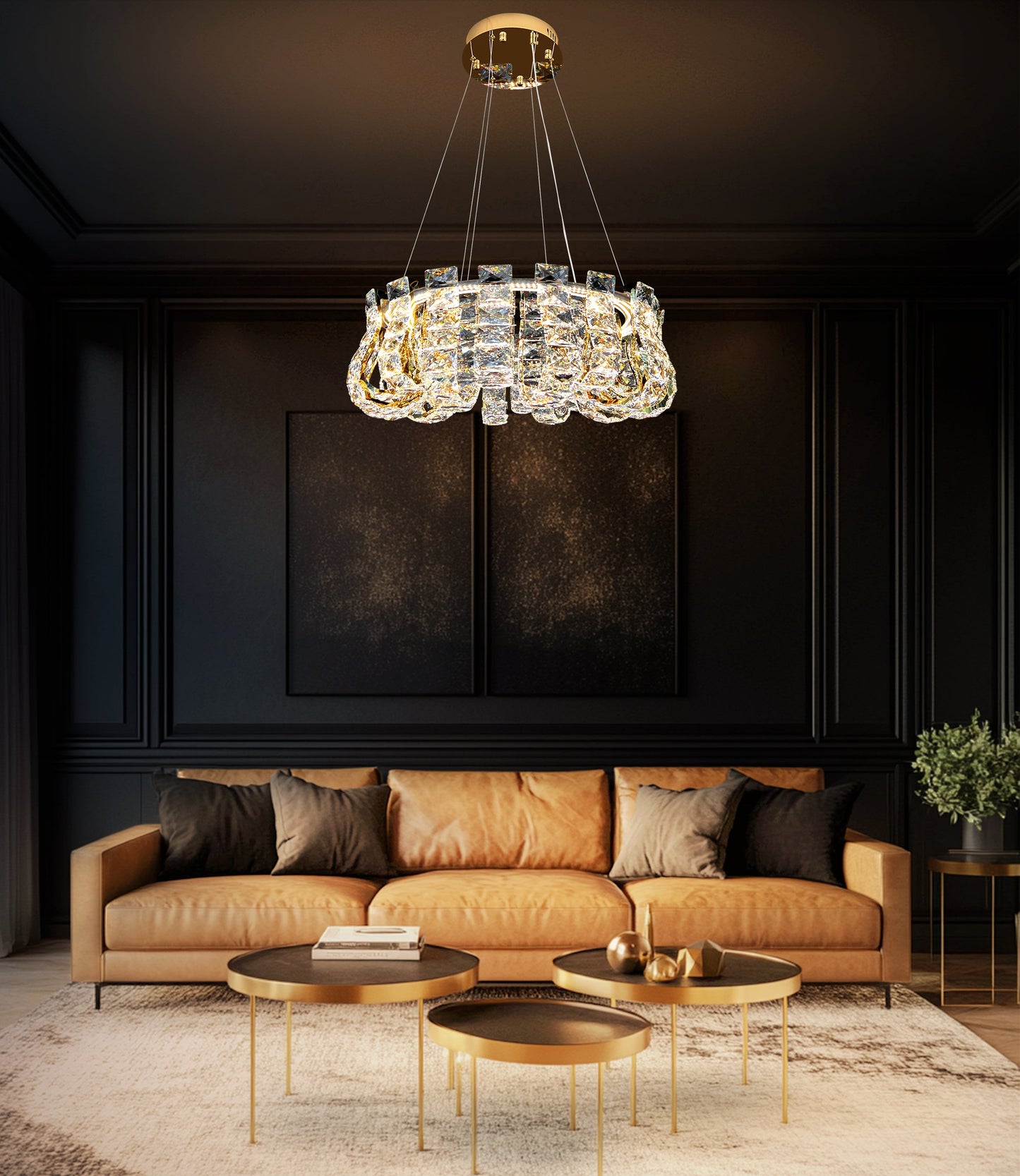 Modern gold crystal chandelier hanging over a dining table in an elegant contemporary interior.
