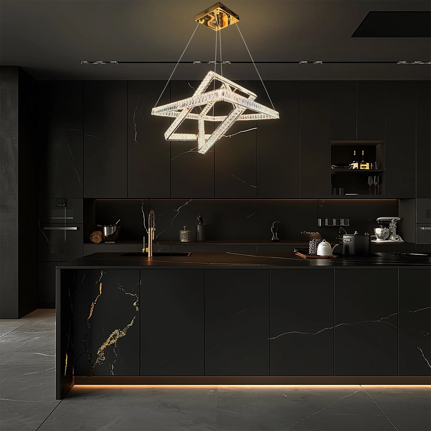 Modern LED crystal chandelier illuminating a kitchen island and dining space.